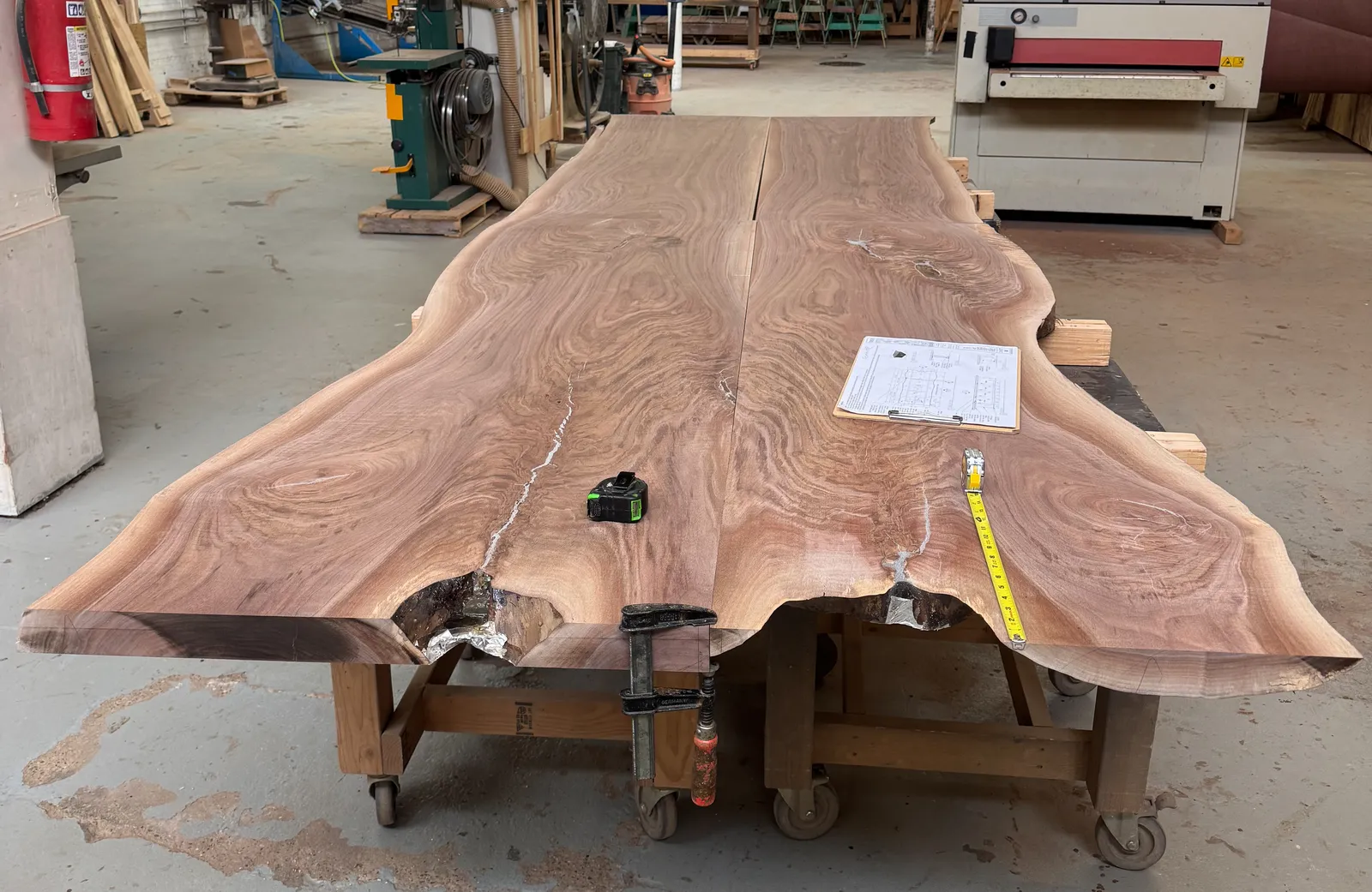 custom bookmatch slab tables by Icon Modern