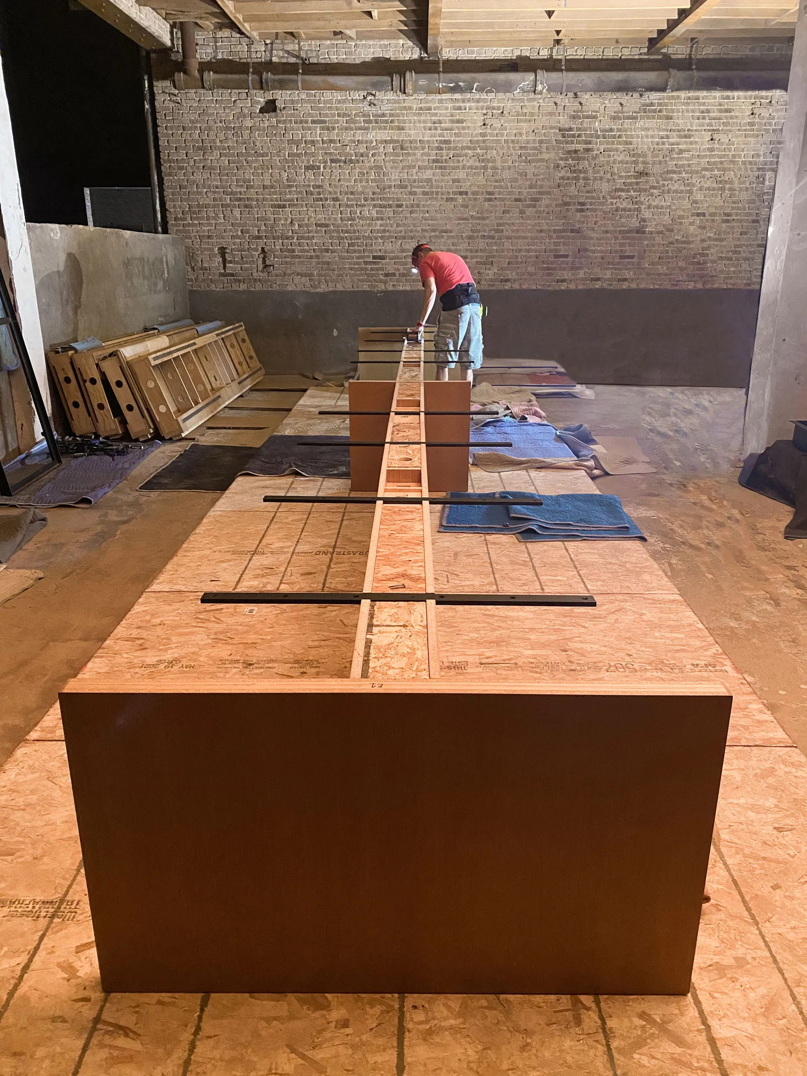 custom library table during fabrication by Icon Modern