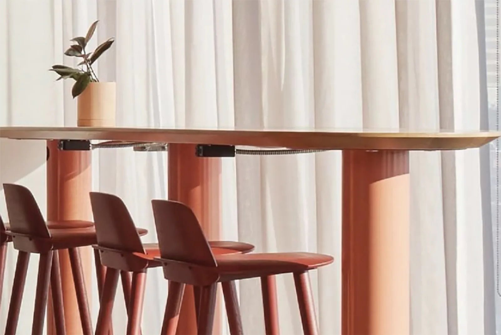 Coral powdercoat on custom, pill-shaped counter