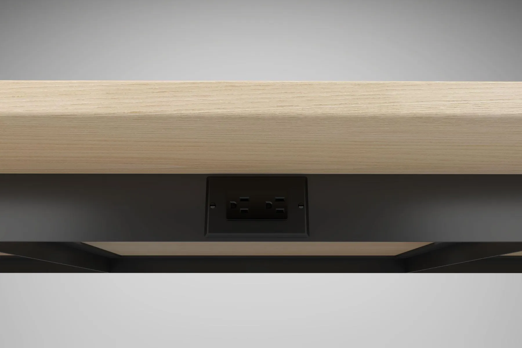 custom table power integration by Icon Modern (below-surface steel apron)