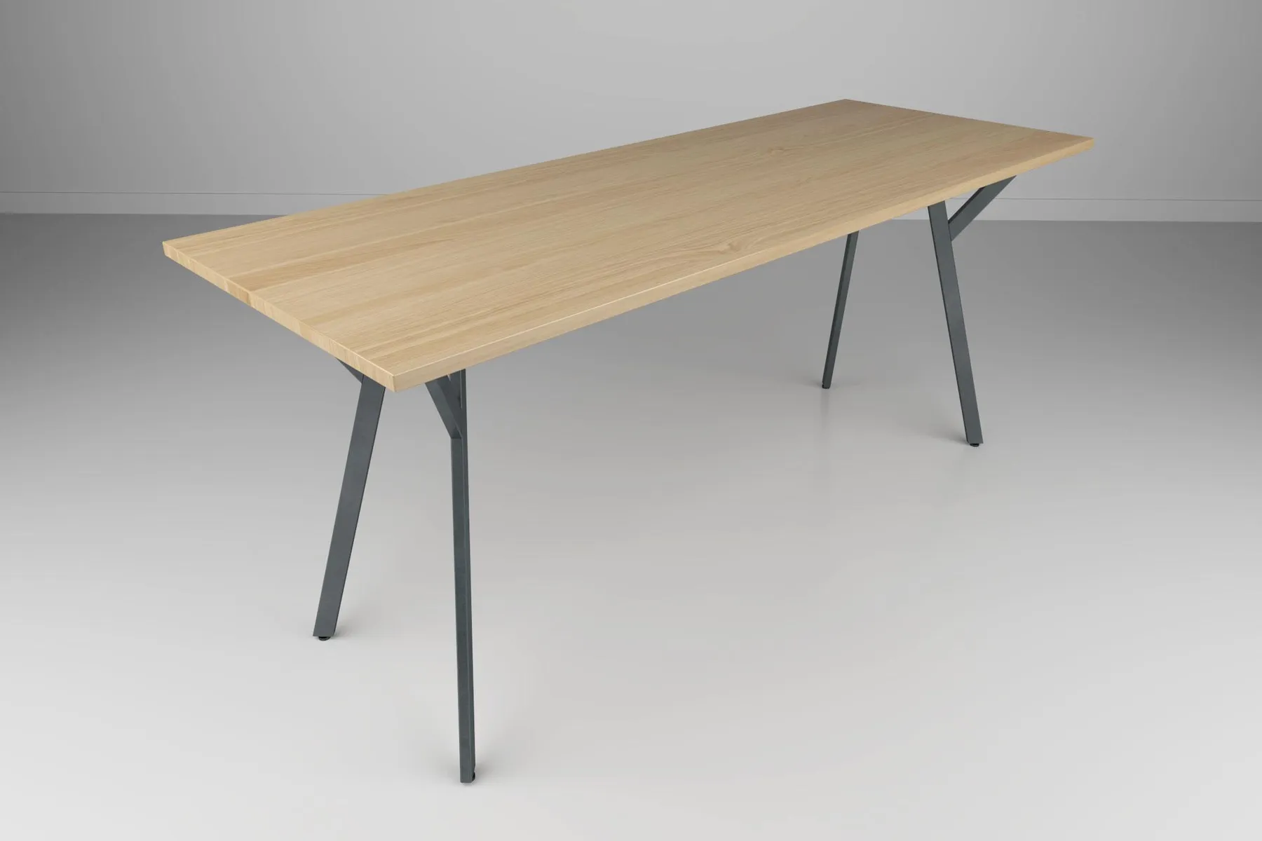 custom community table with angled base by Icon Modern