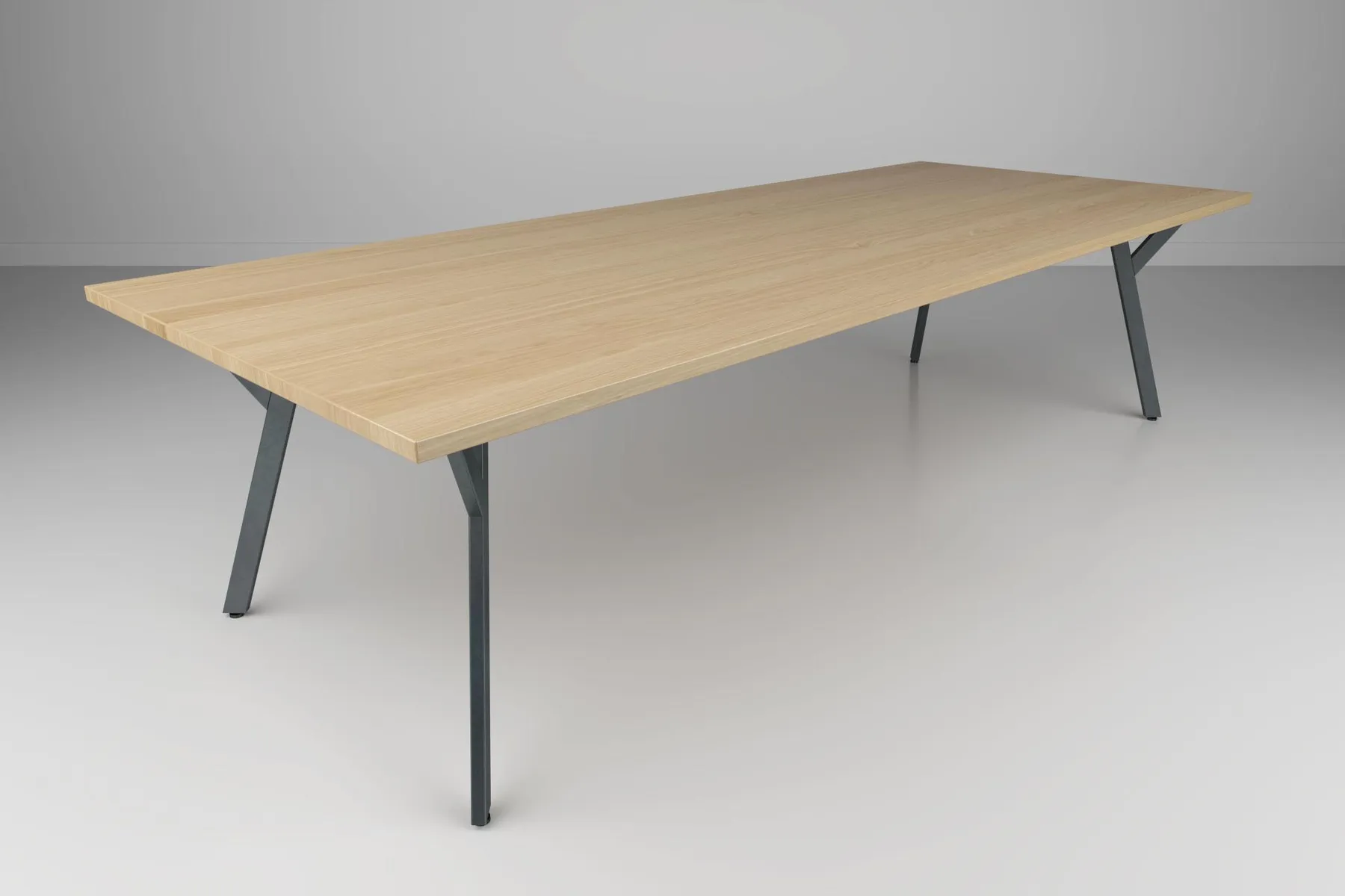 custom conference table with angled base by Icon Modern