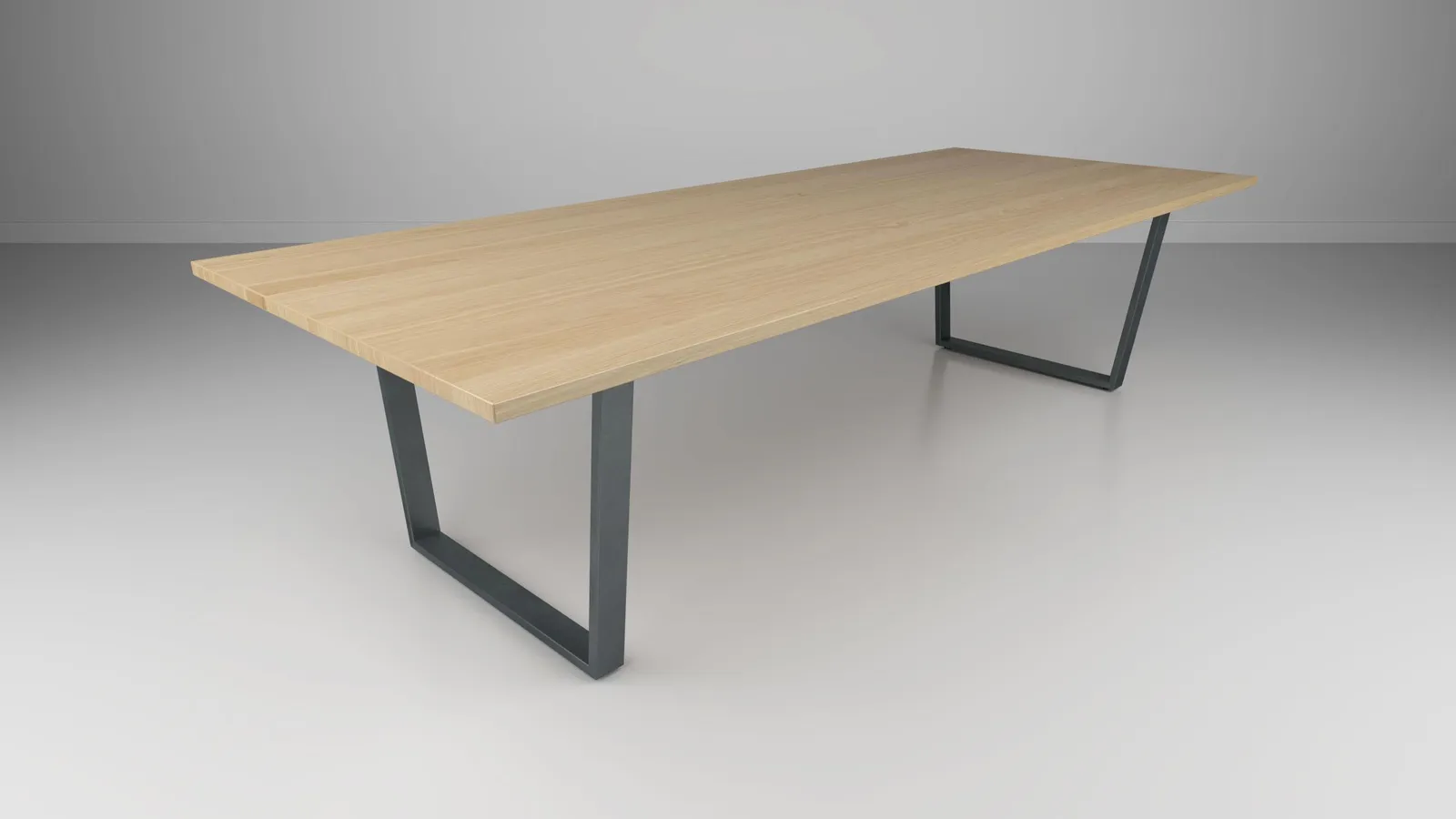 custom conference table with trapezoid base by Icon Modern
