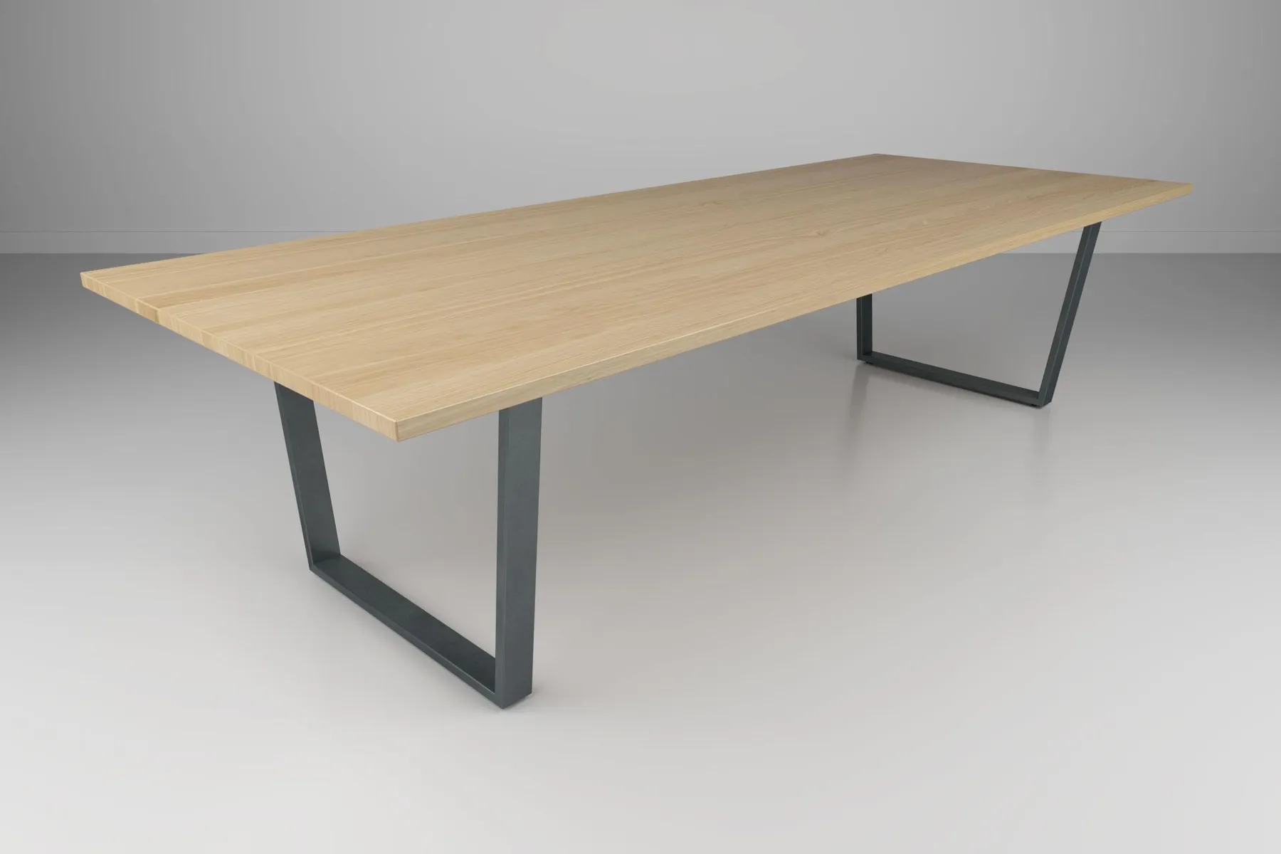 custom conference table with trapezoid base by Icon Modern