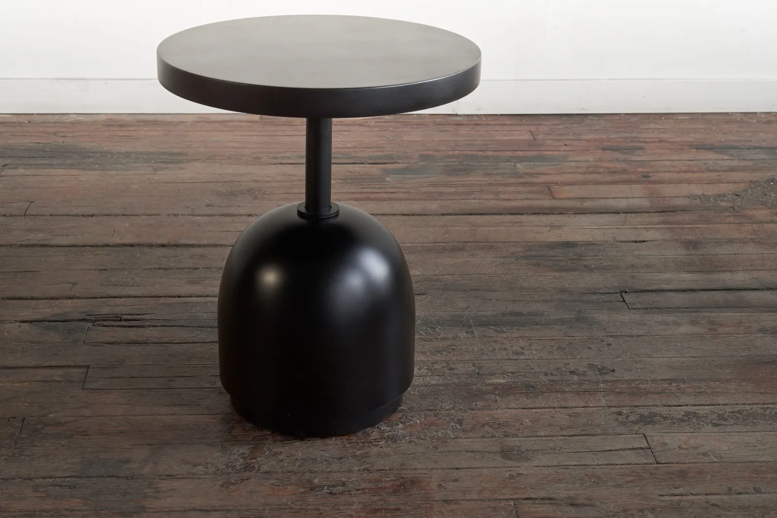 custom side table in ebonized maple with turned base by Icon Modern