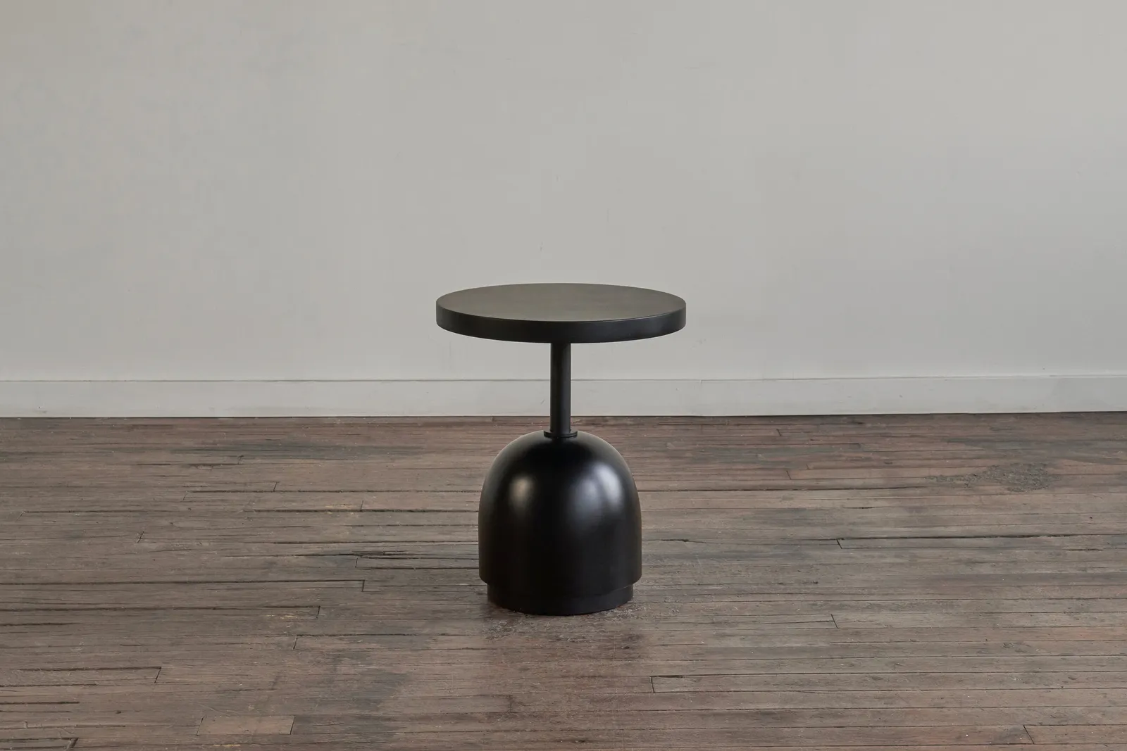 custom side table in ebonized maple wood with turned base + steel support by Icon Modern