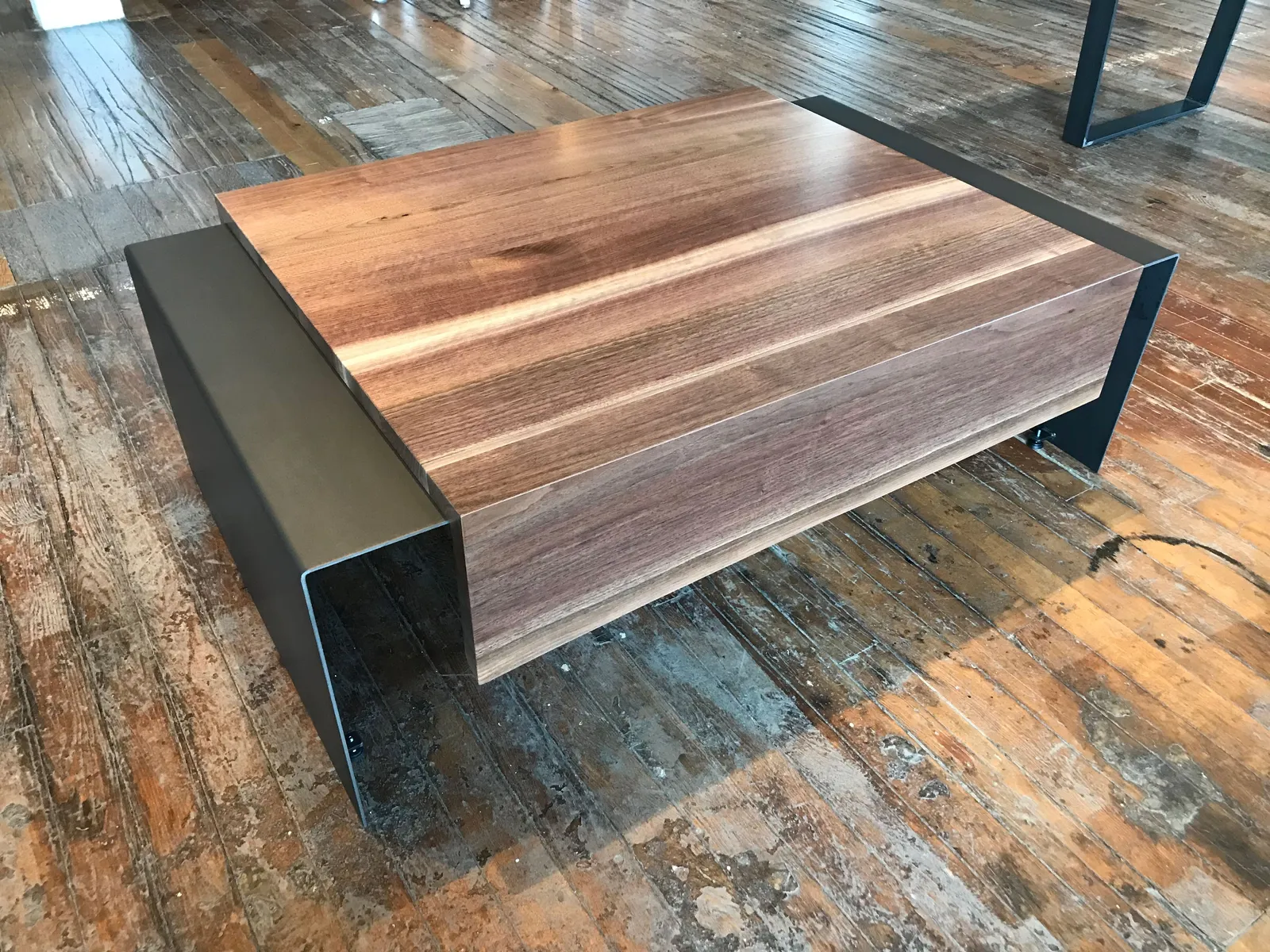 Custom coffee table live edge walnut bent steel plate base by icon modern