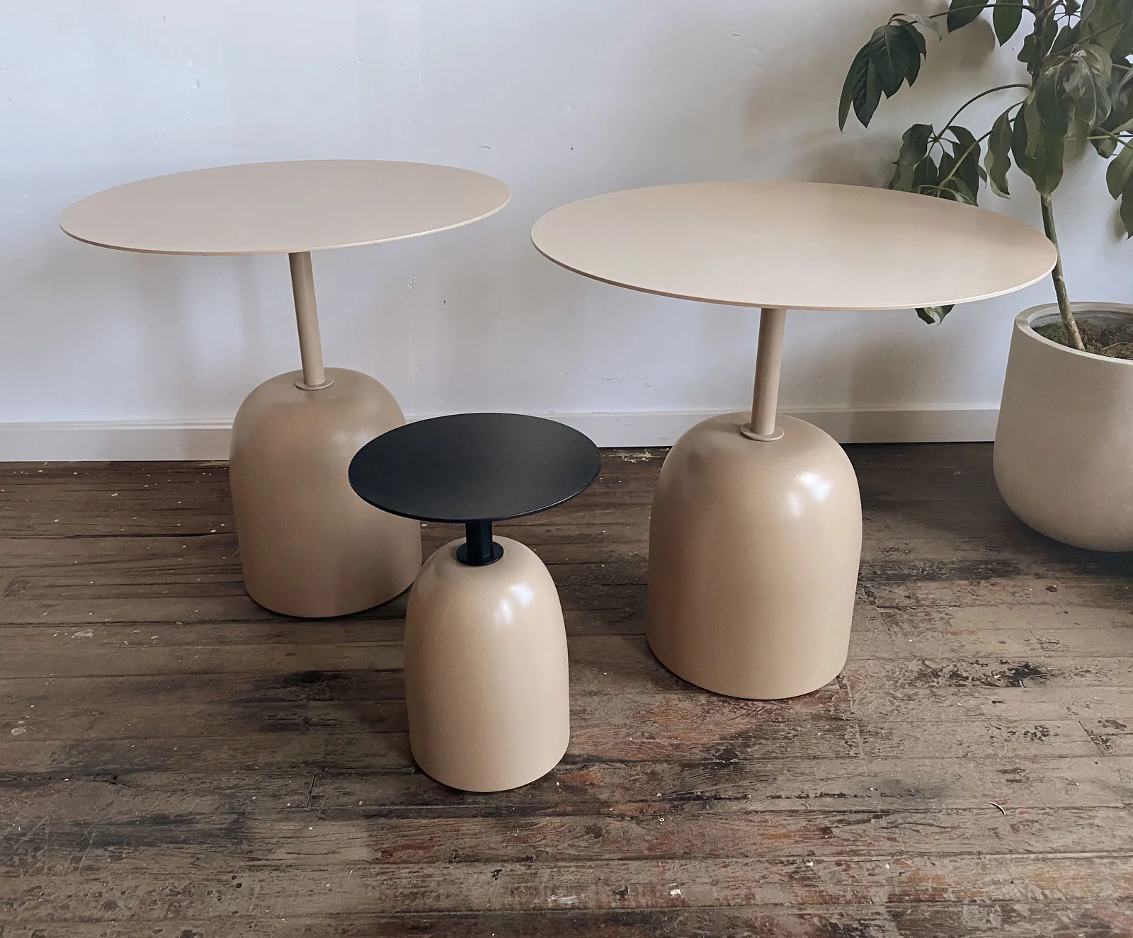 custom side tables with steel tops and turned bases by Icon Modern