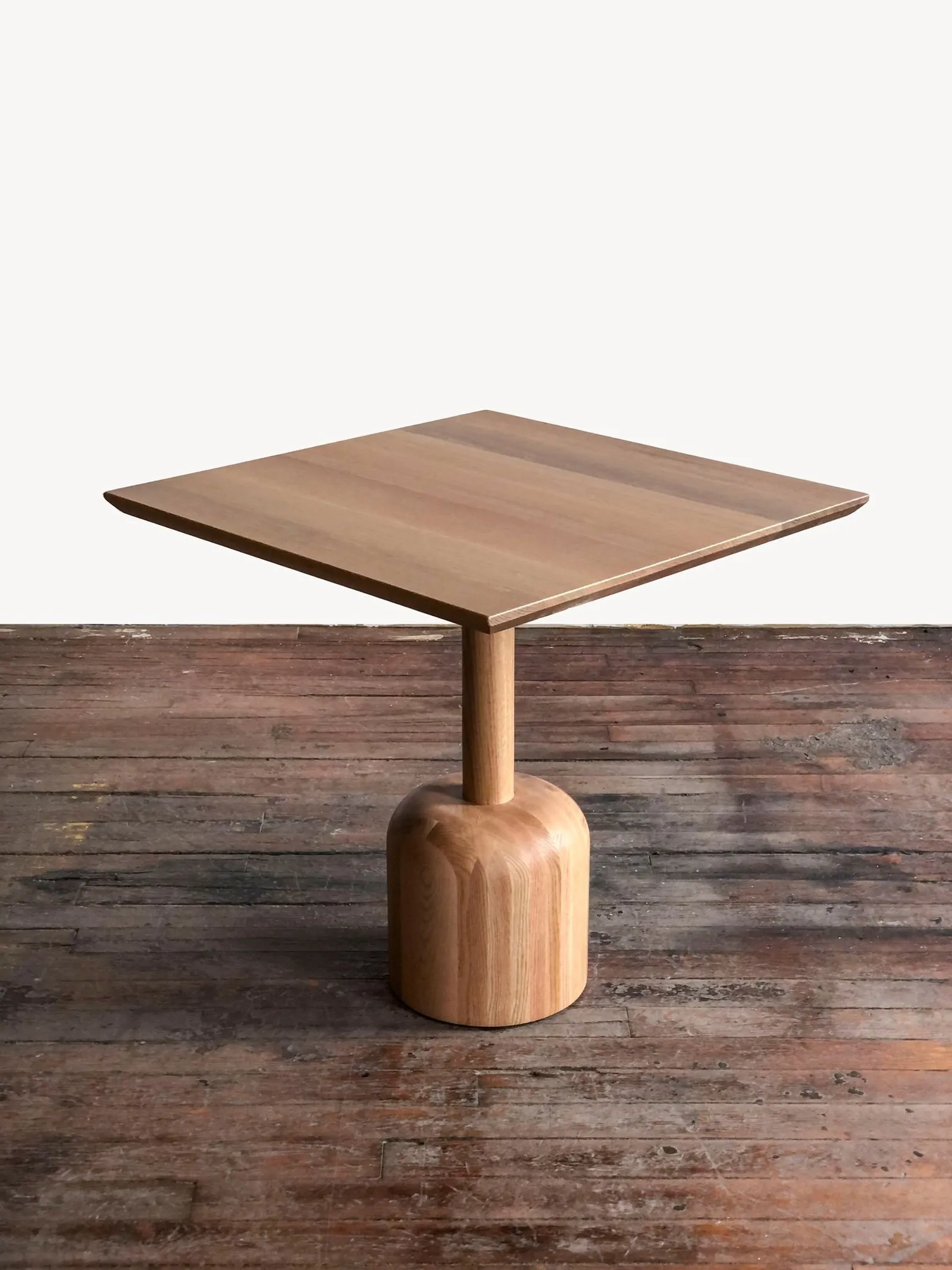 Custom solid oak cafe table turned base by icon modern