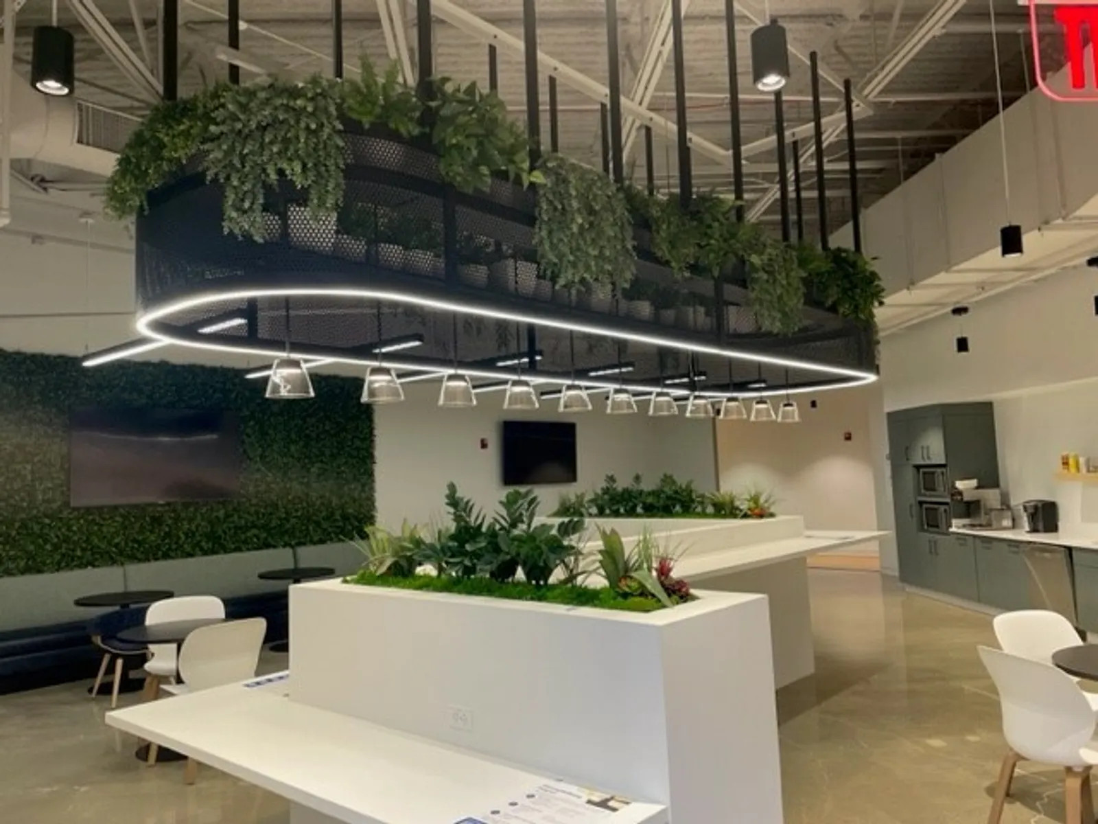 custom ceiling element in steel pill shape with perforated metal infill by Icon Modern