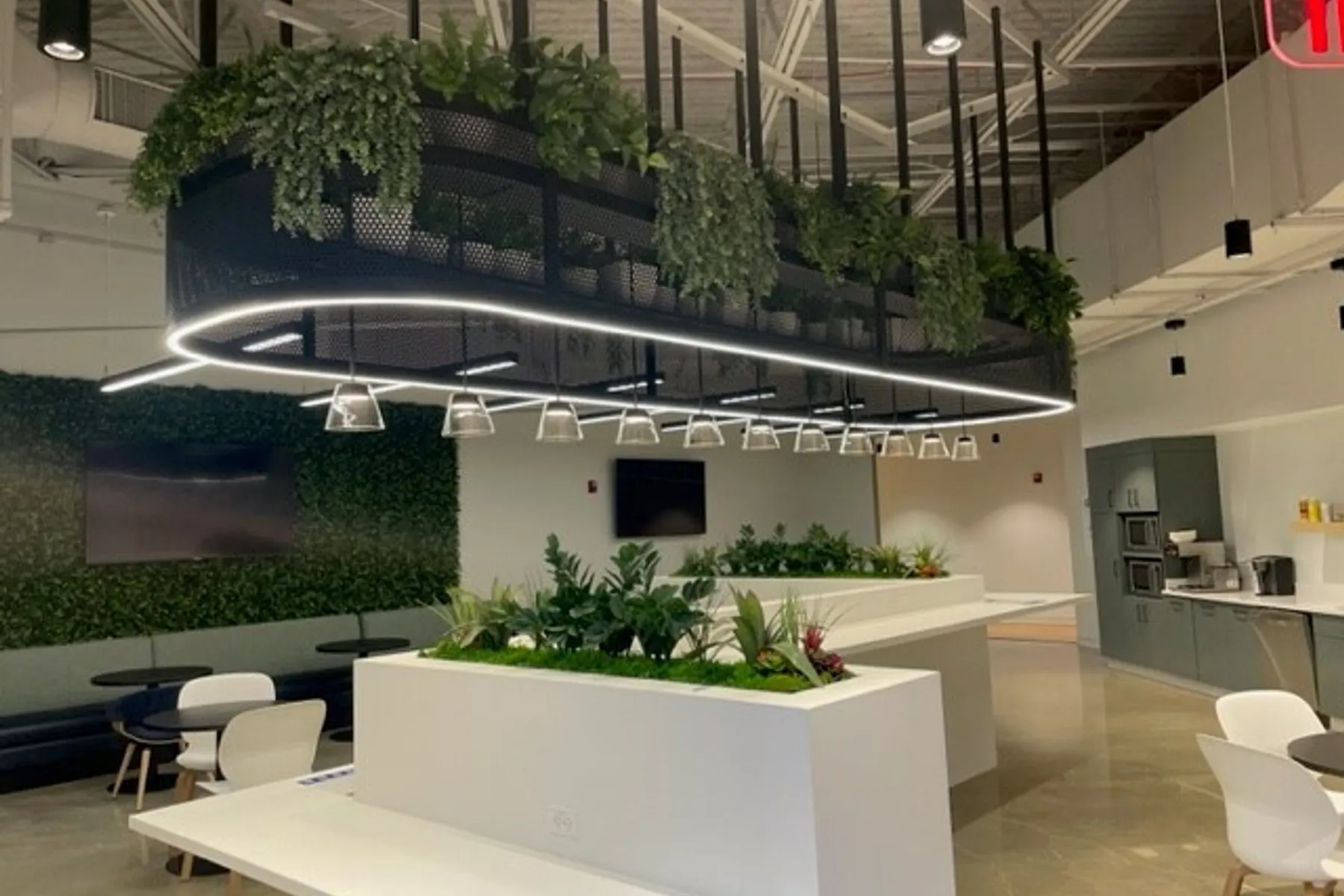 custom ceiling element in steel pill shape with perforated metal infill by Icon Modern