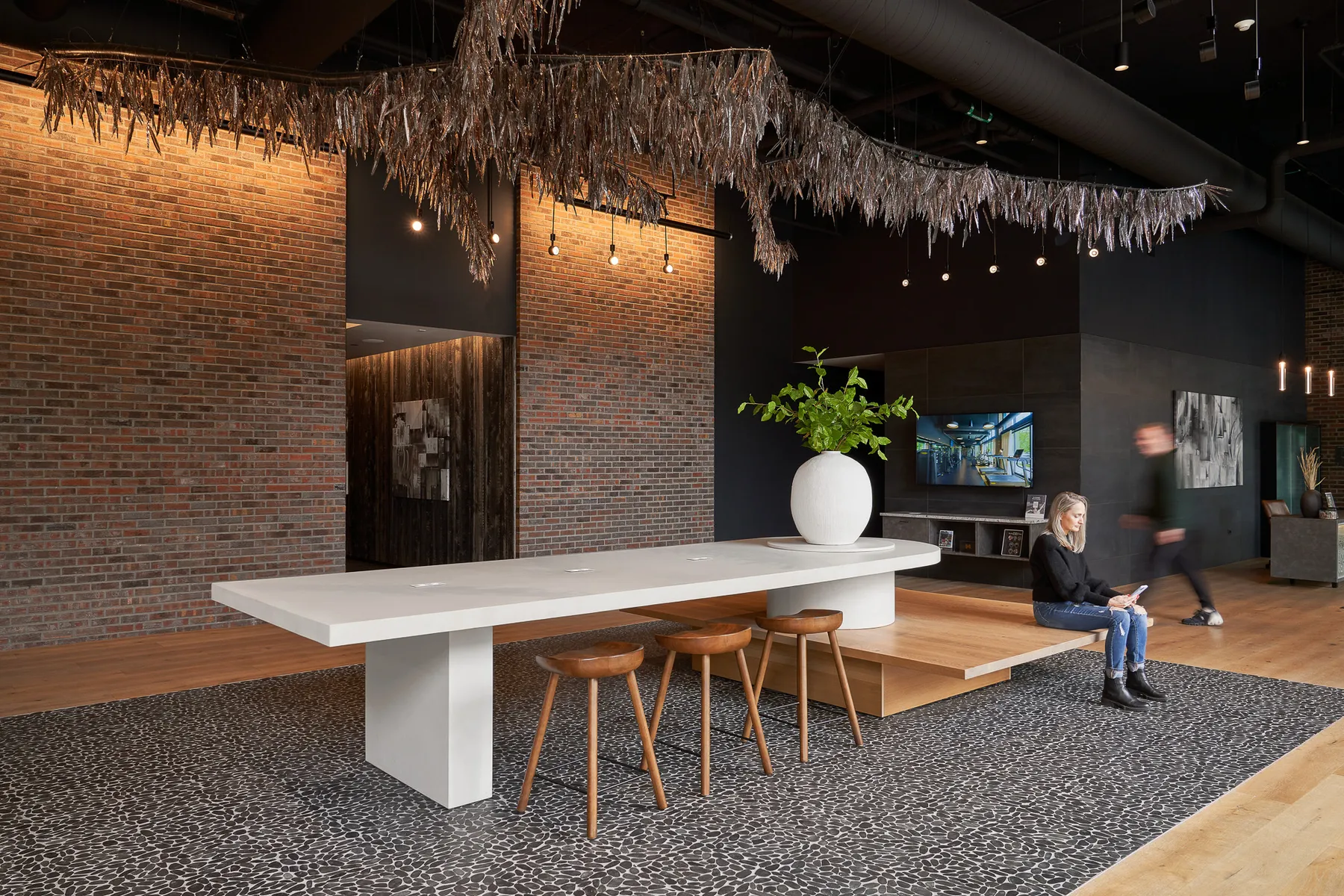 custom concrete table with live edge wood bench by Icon Modern