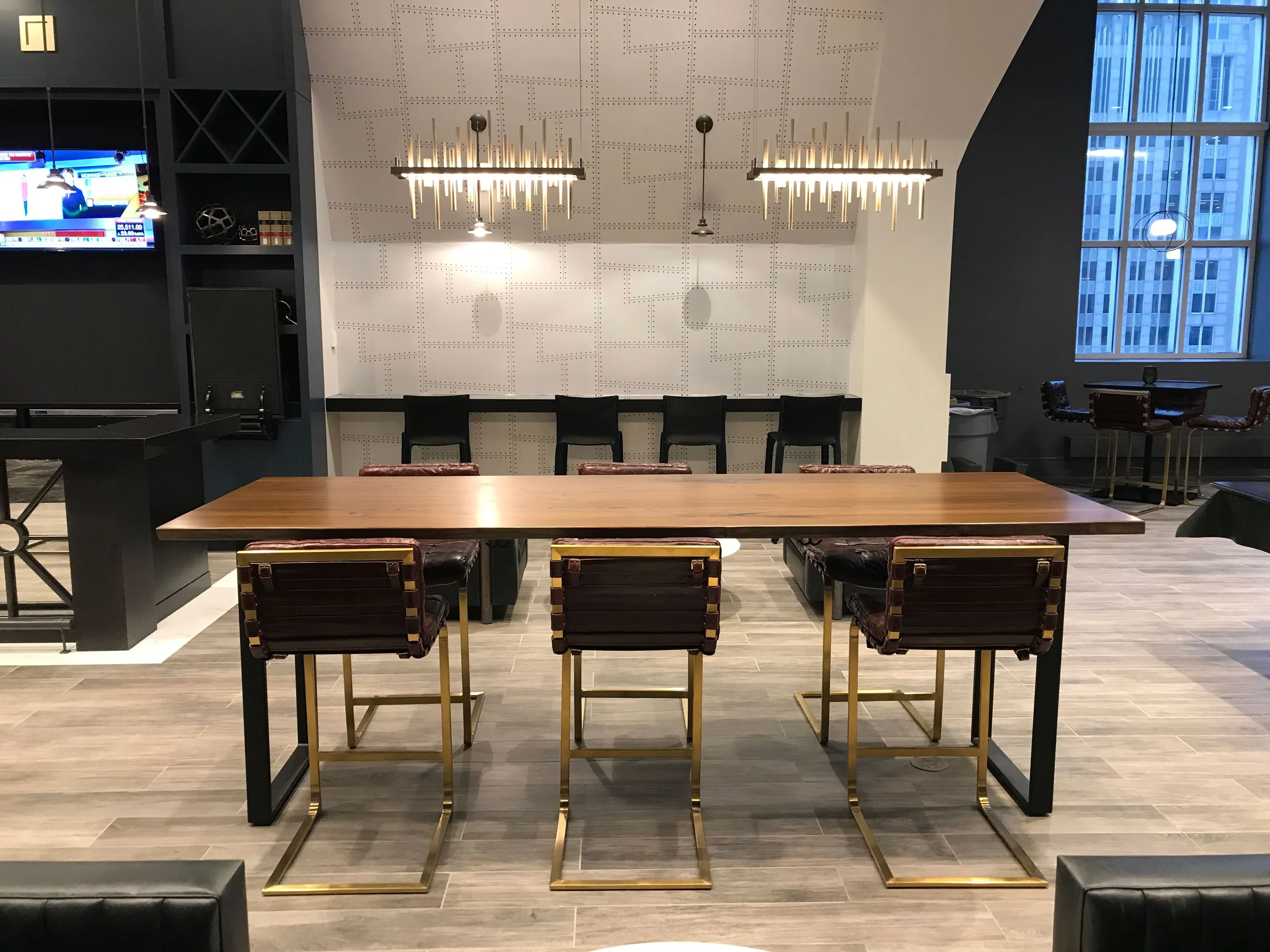 custom community table in urban walnut by Icon Modern