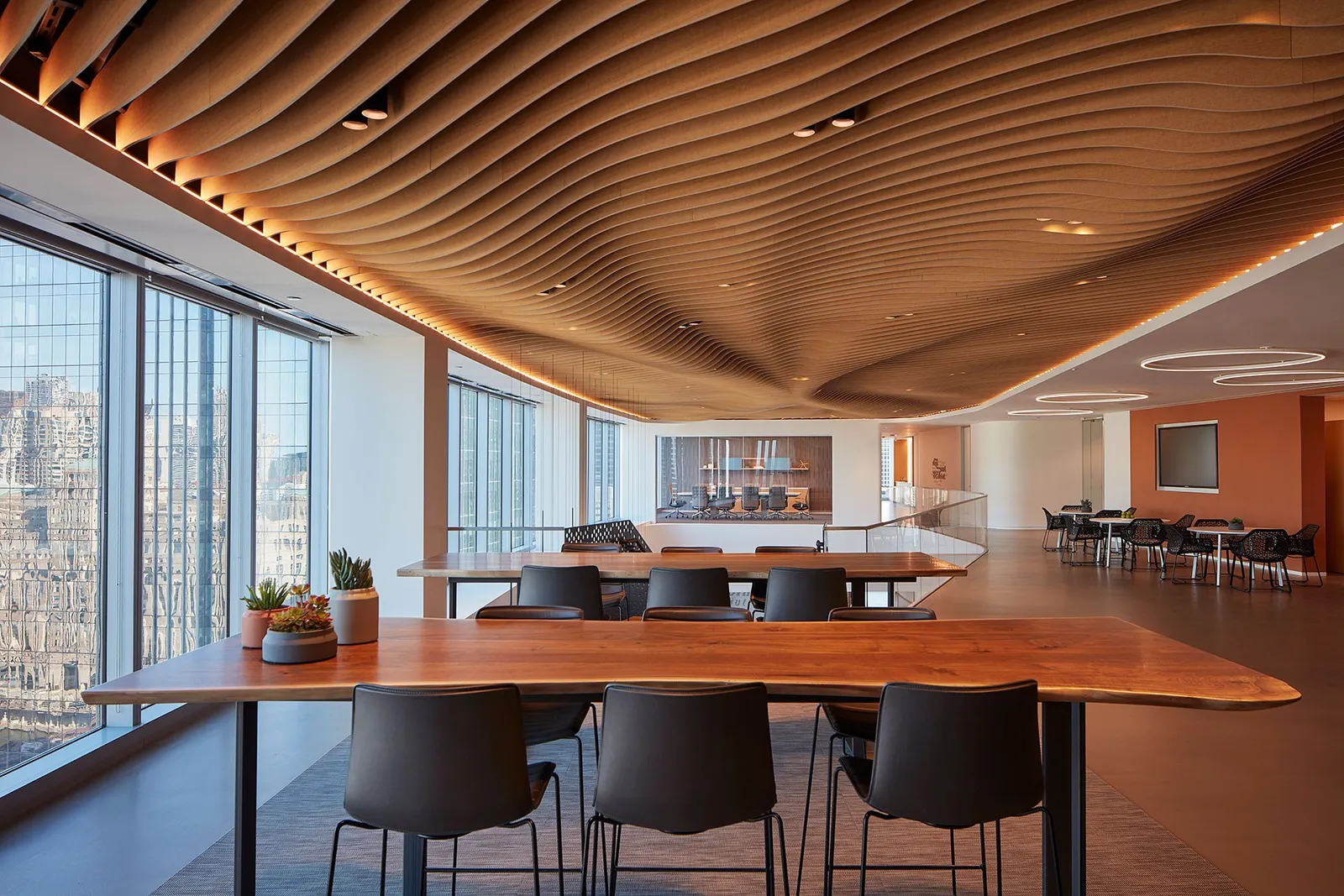 Custom community table walnut live edge steel base by Icon Modern