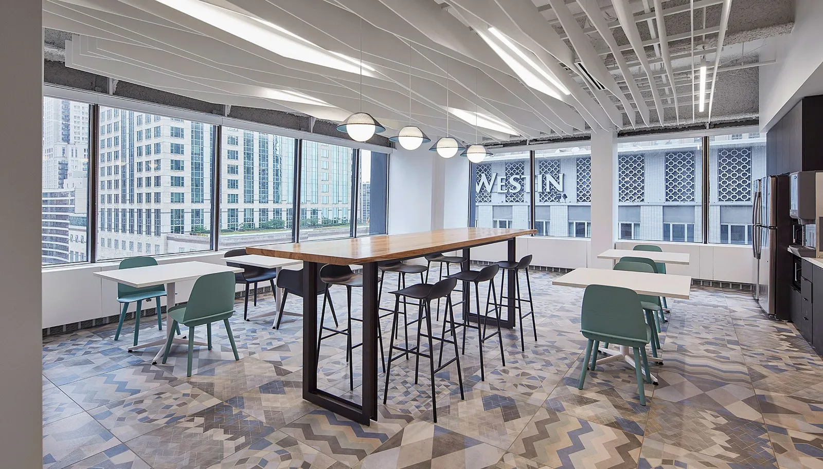custom community table in urban walnut by Icon Modern