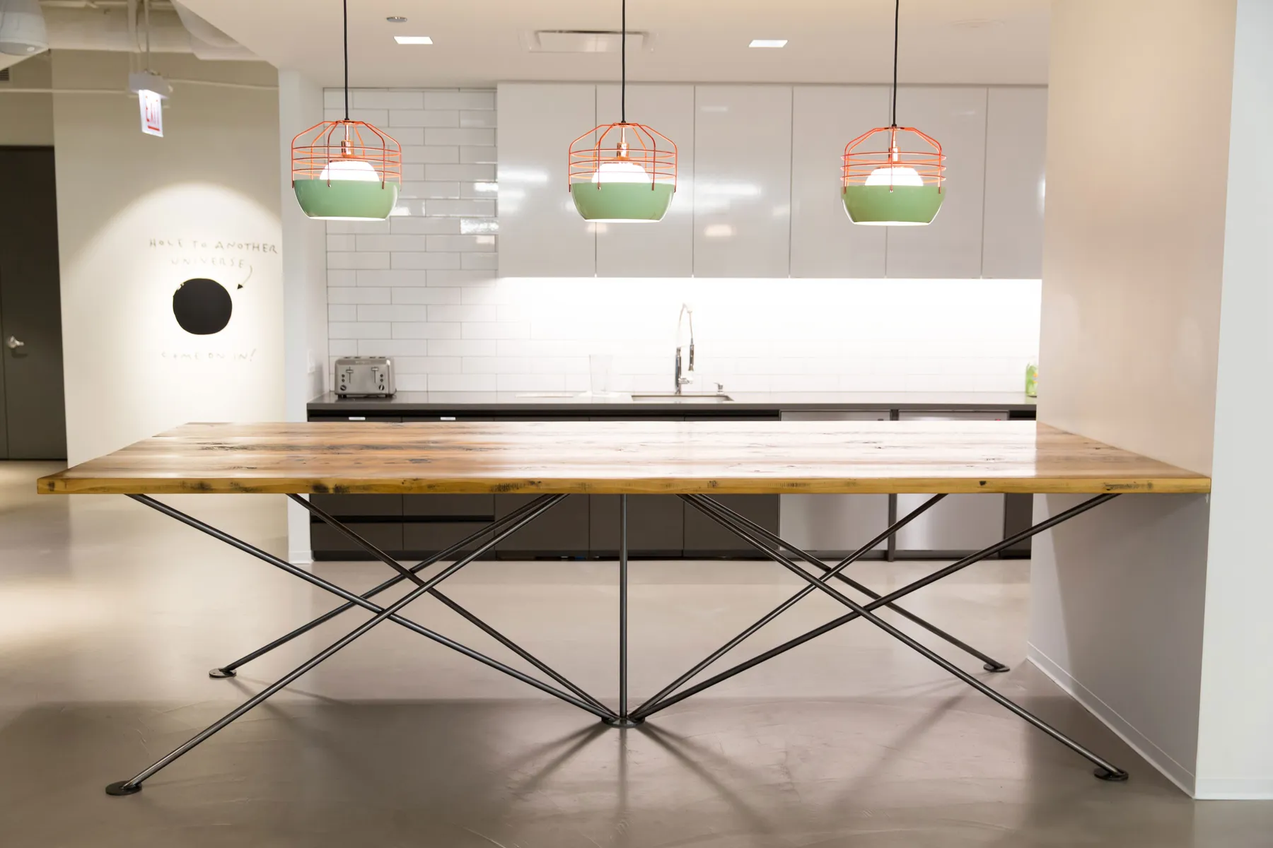 Custom community table old growth steel spider base by icon modern