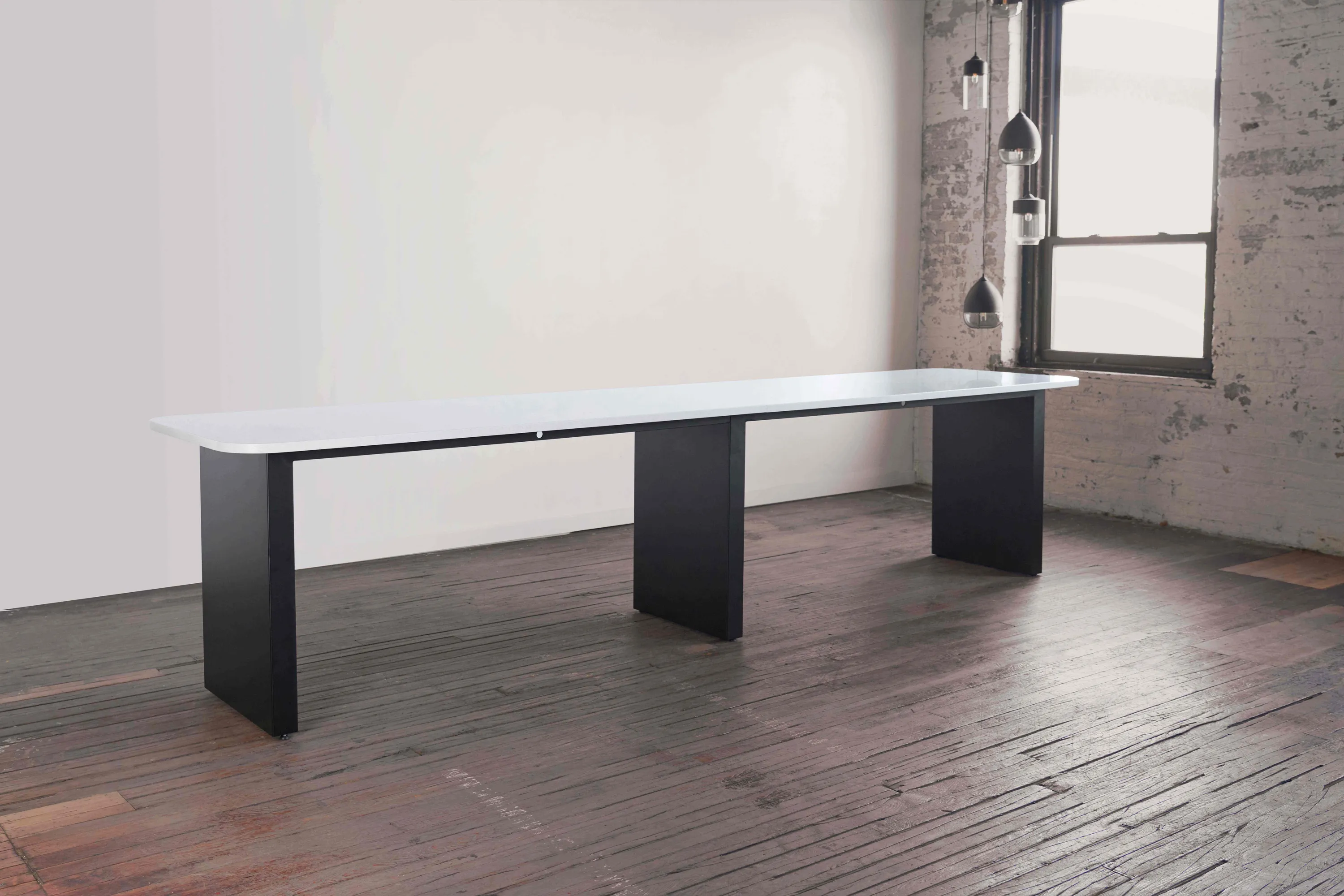 Custom community table solid surface bar height panel base by Icon Modern