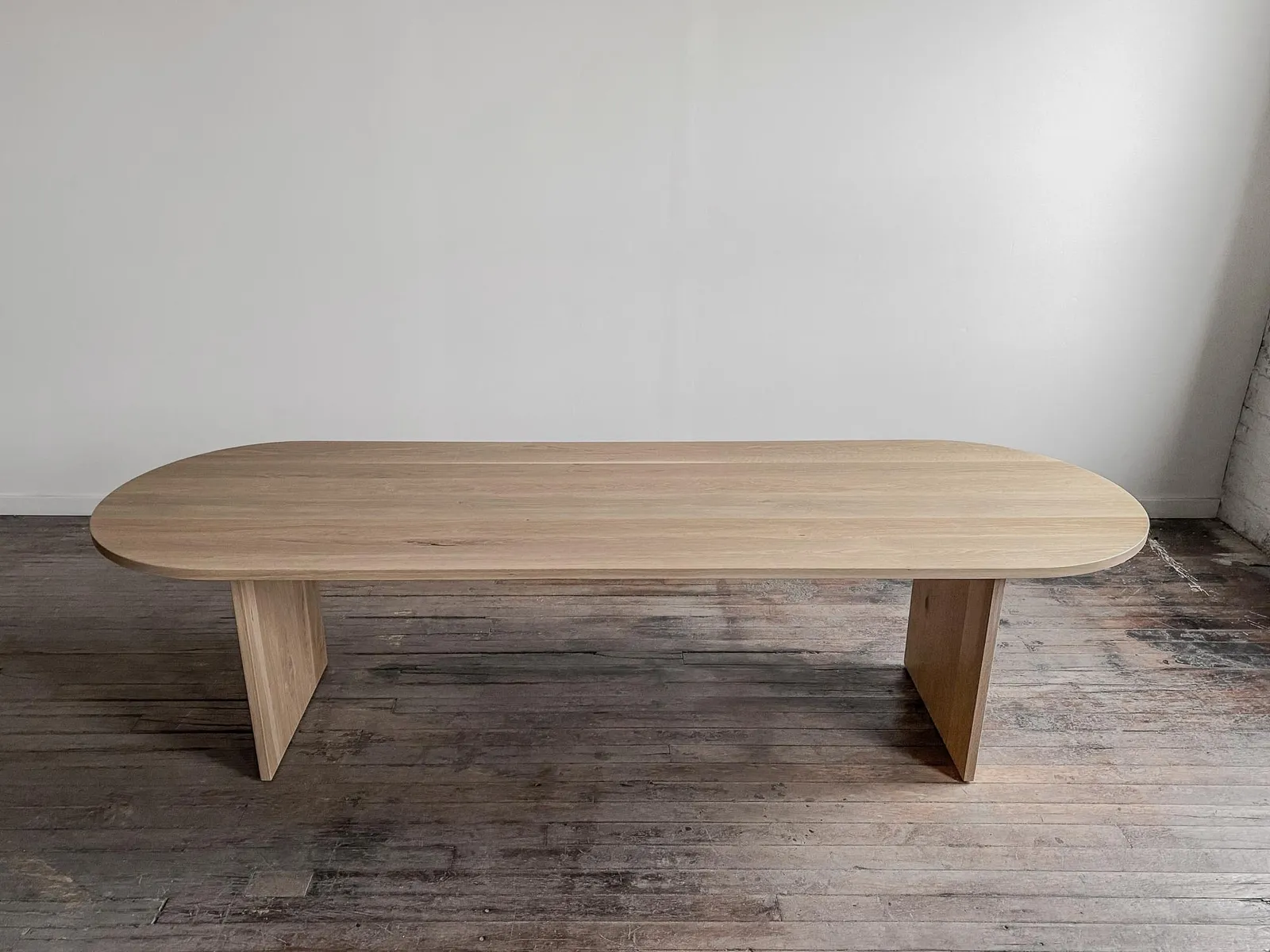 custom conference table in urban oak by Icon Modern