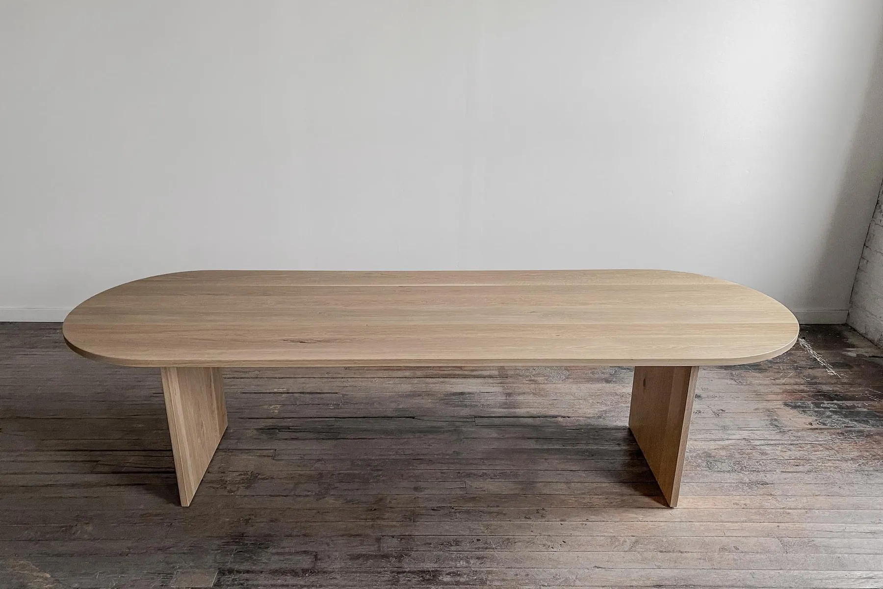 custom conference table in urban oak by Icon Modern