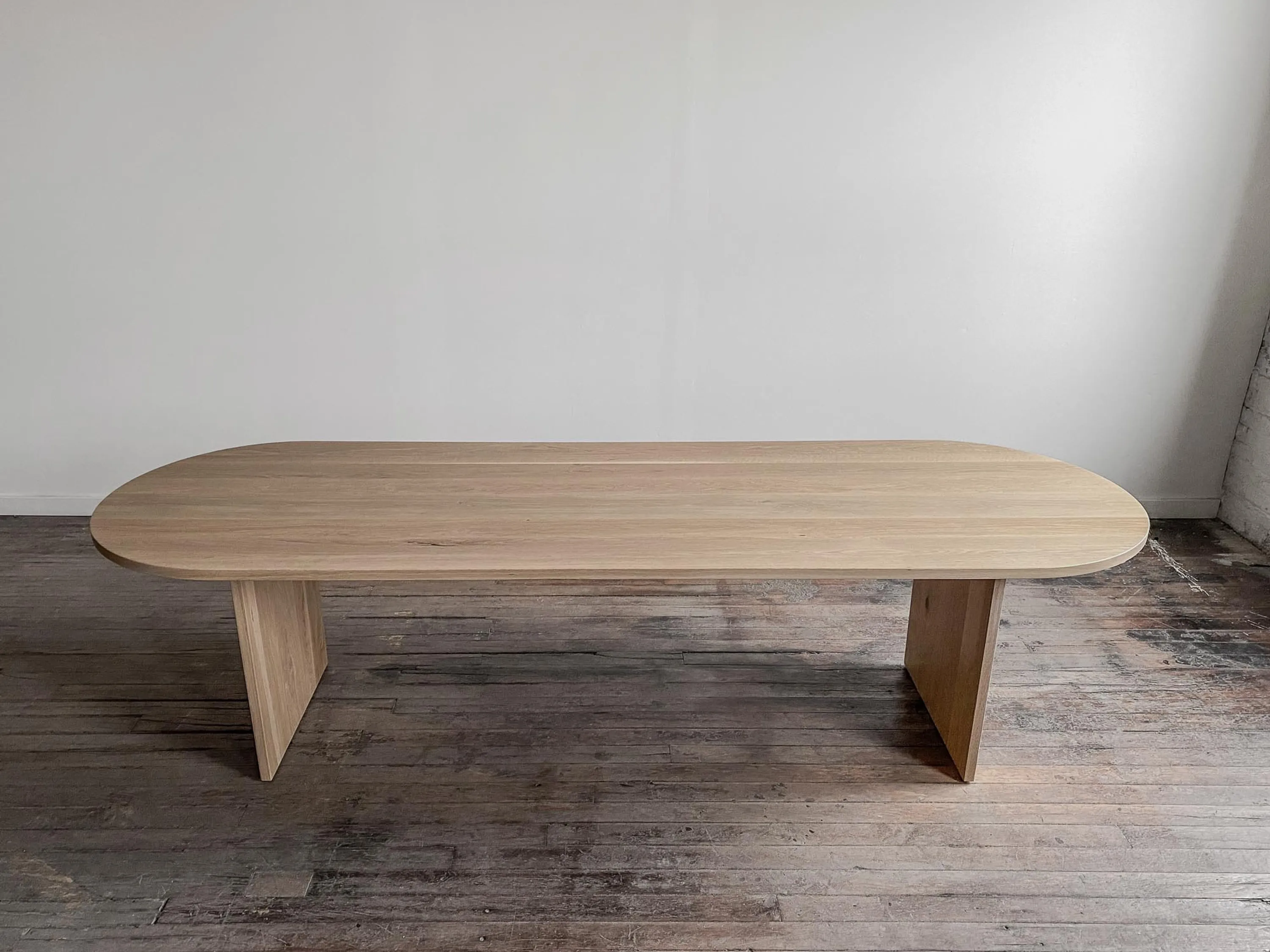 custom conference table in urban oak by Icon Modern