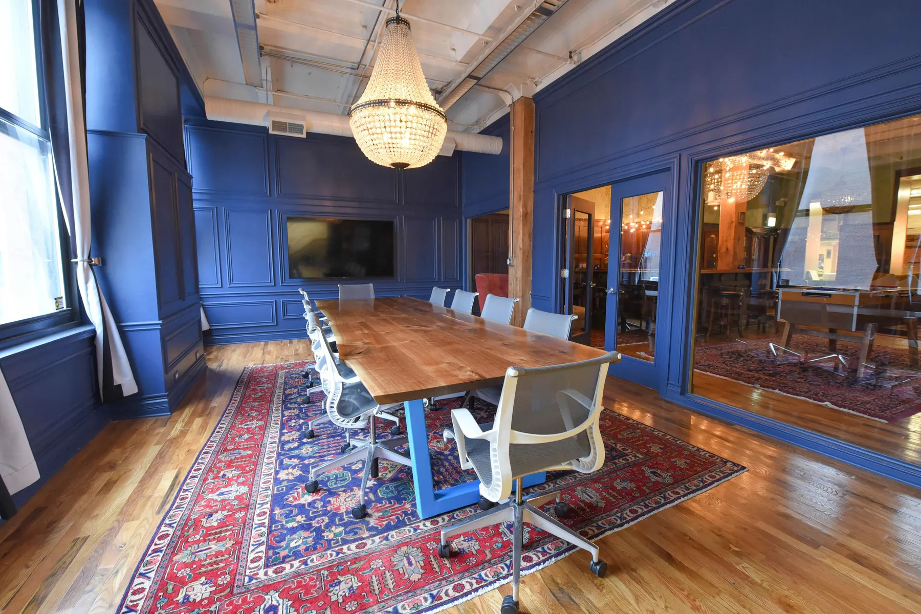 Custom urban walnut live edge conference table trapezoid steel powdercoat base by icon modern