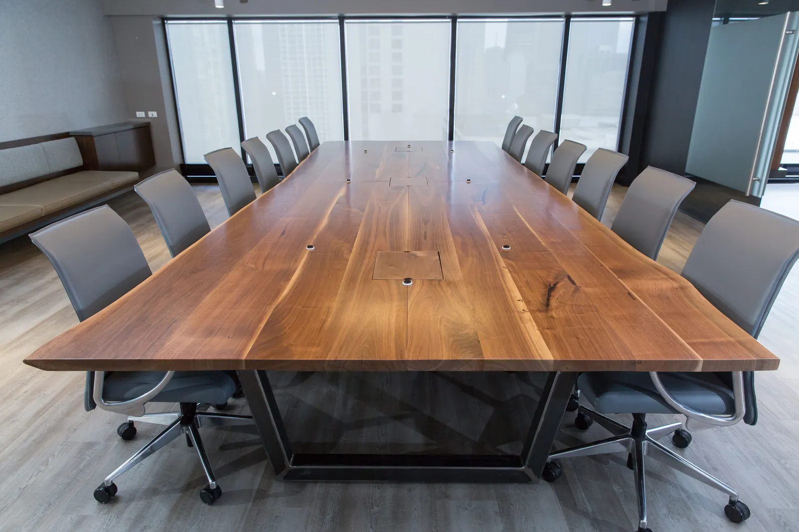 Custom applied live edge walnut conference table trapezoid power
