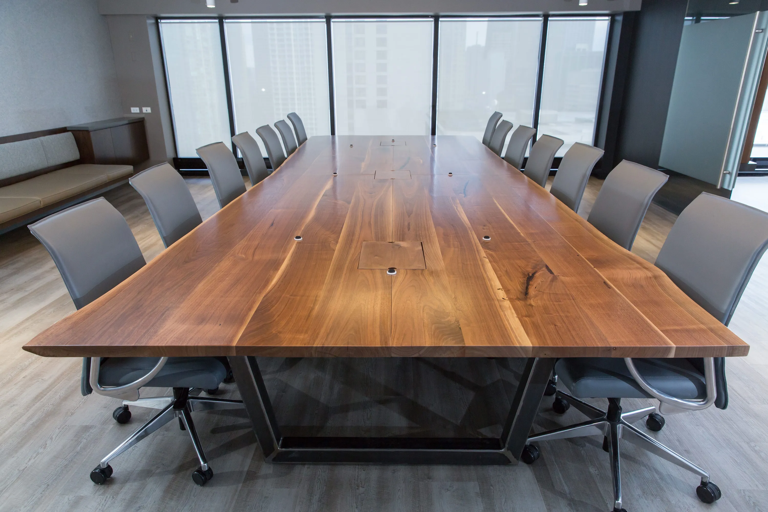 Custom applied live edge walnut conference table trapezoid power