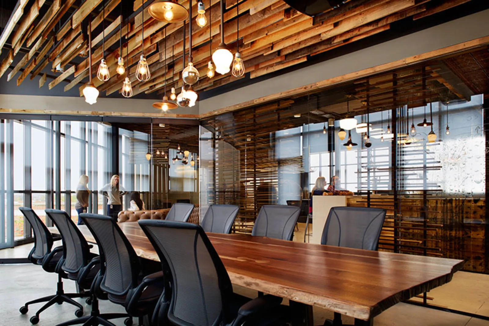 Custom applied live edge walnut conference table by icon modern