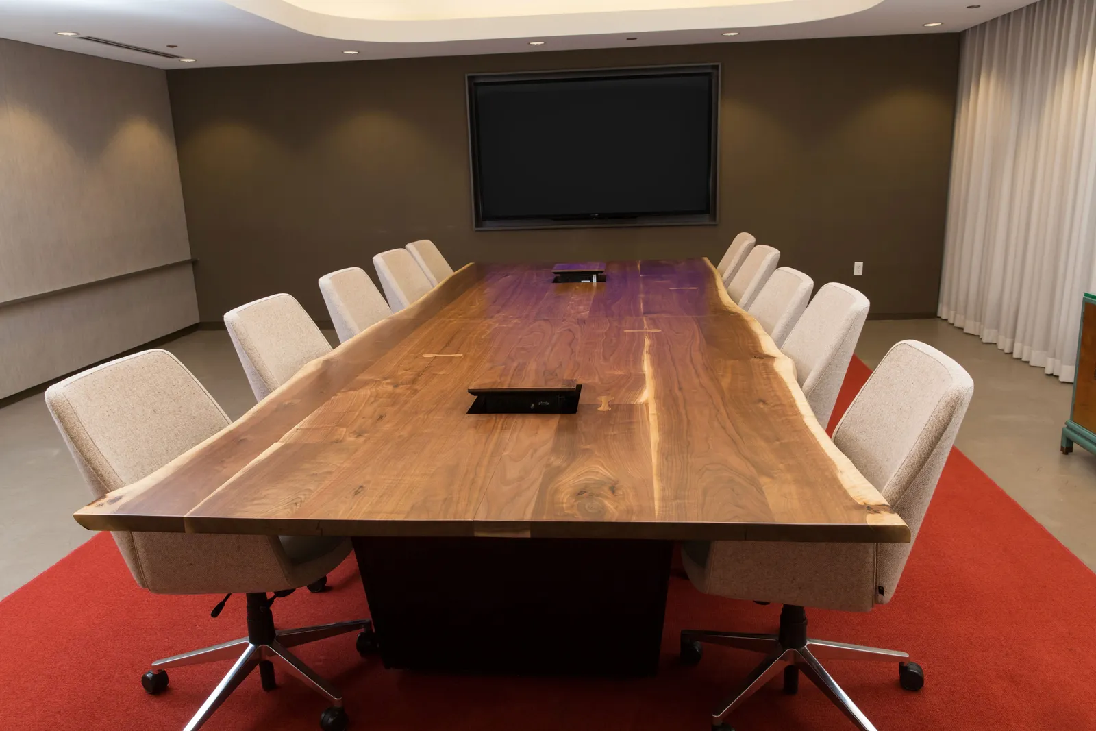 custom conference table in urban walnut by Icon Modern
