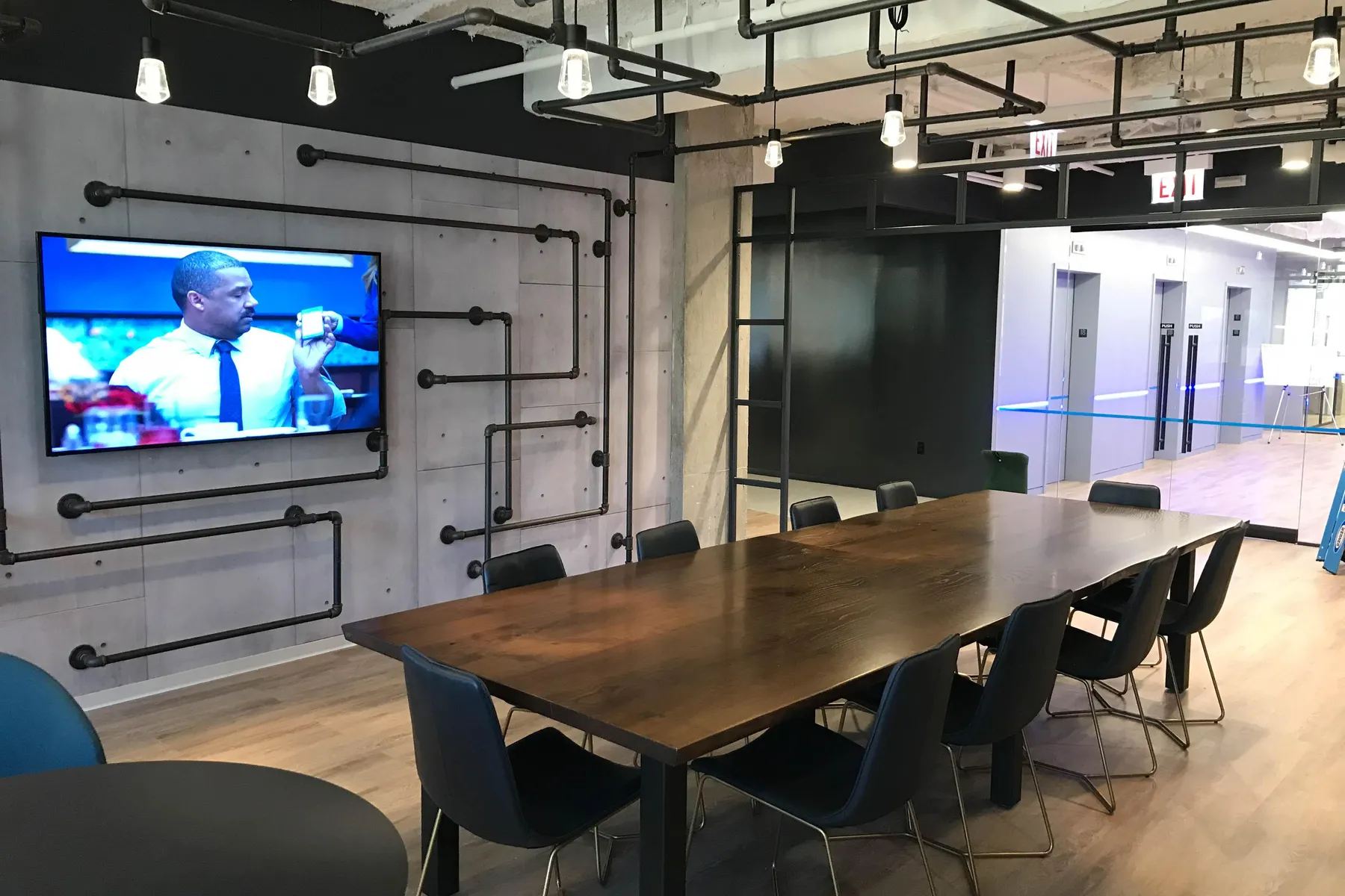 Custom live edge walnut conference table post base by icon modern