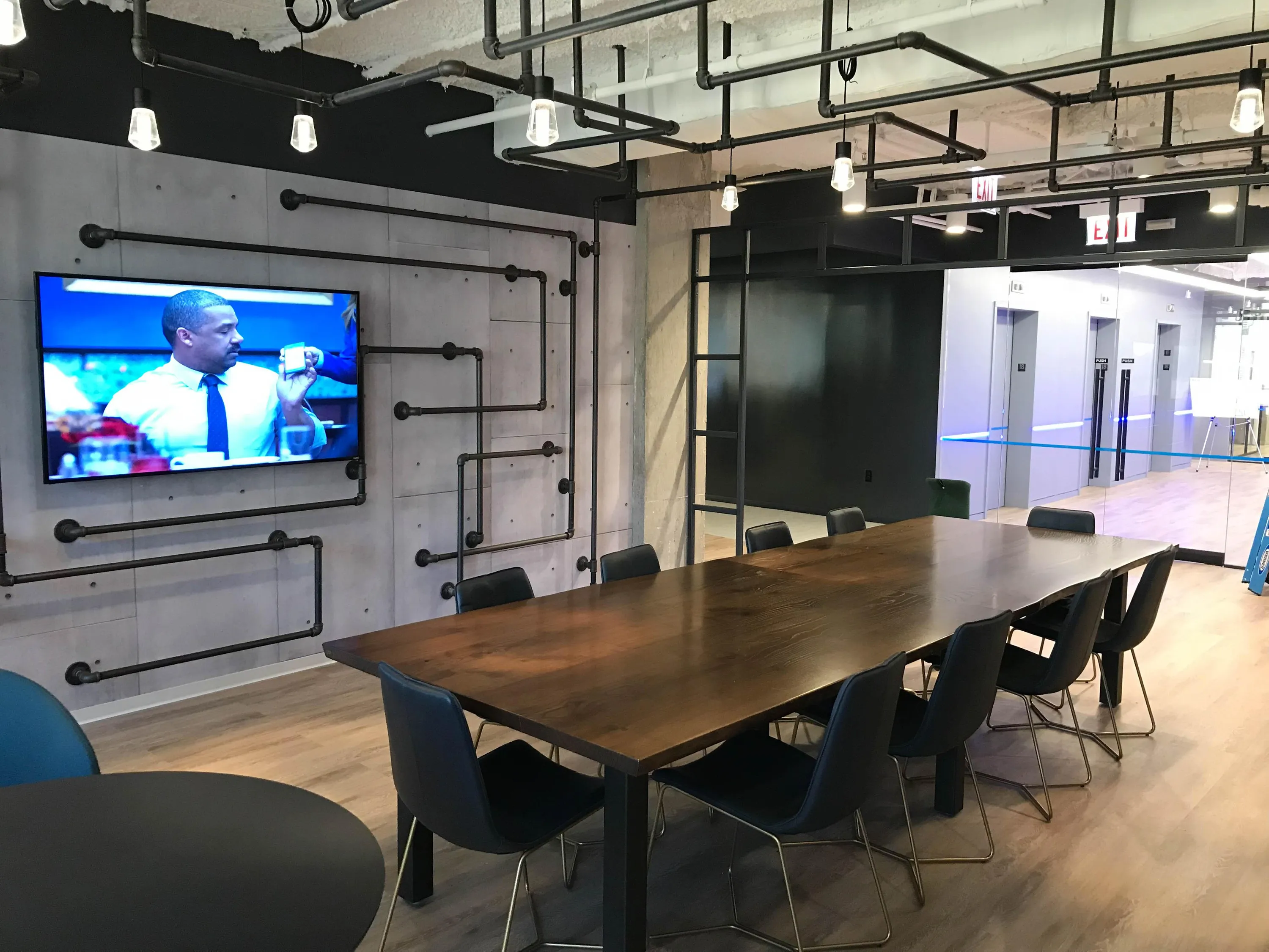 Custom live edge walnut conference table post base by icon modern