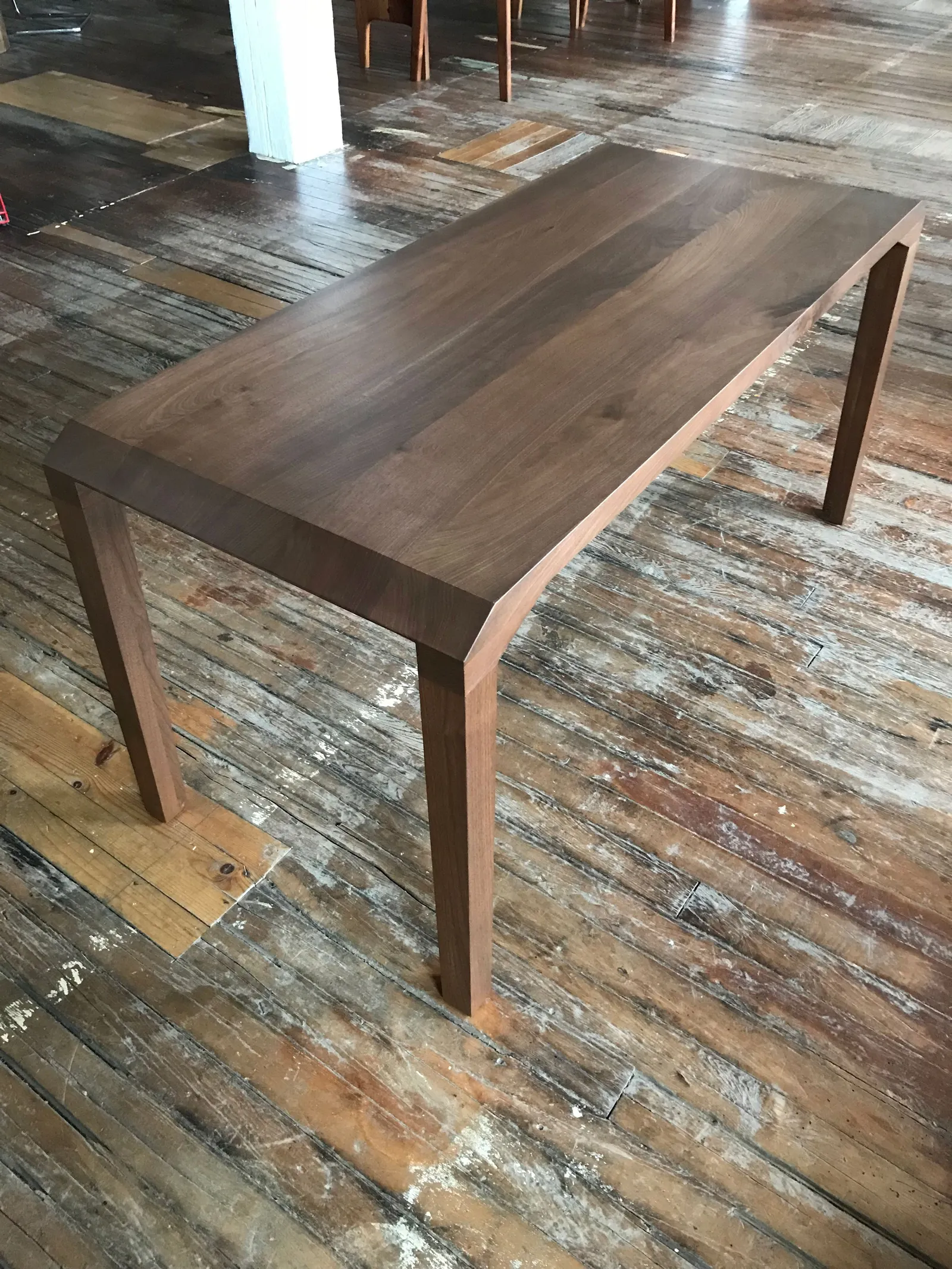 custom desk in walnut with specialty edge finish by Icon Modern