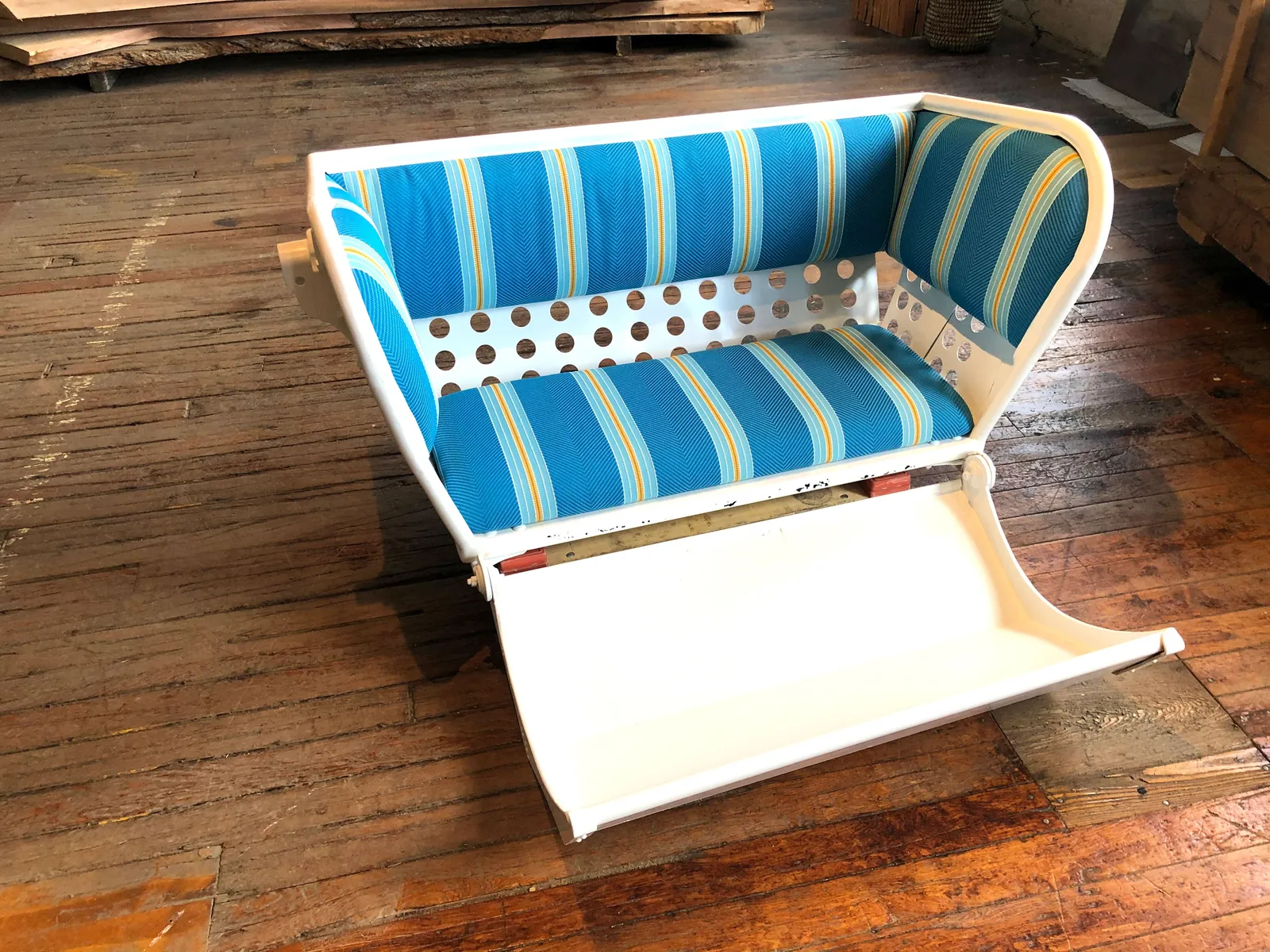 custom chair made from a reclaimed ferris wheel chair by Icon Modern