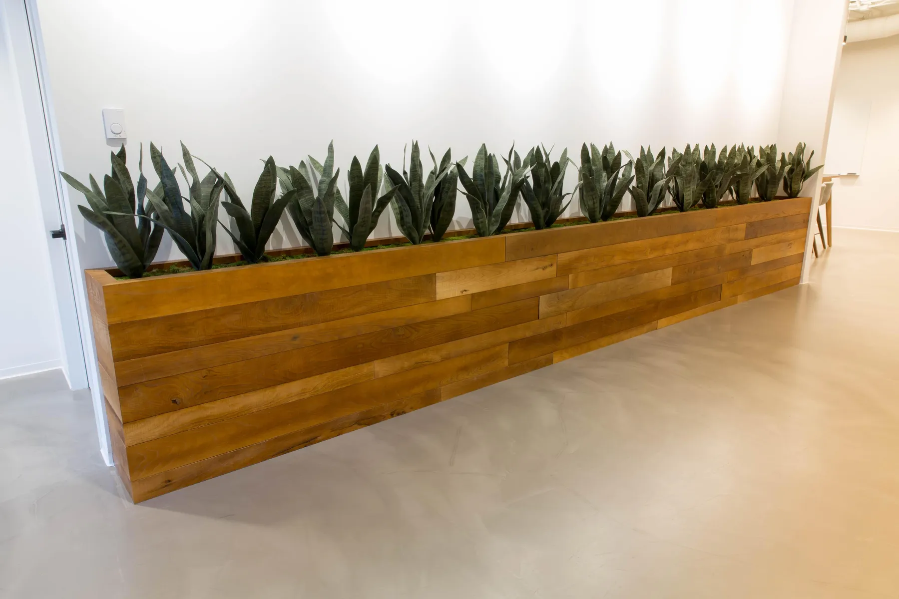 custom planters in urban ash cladding by Icon Modern