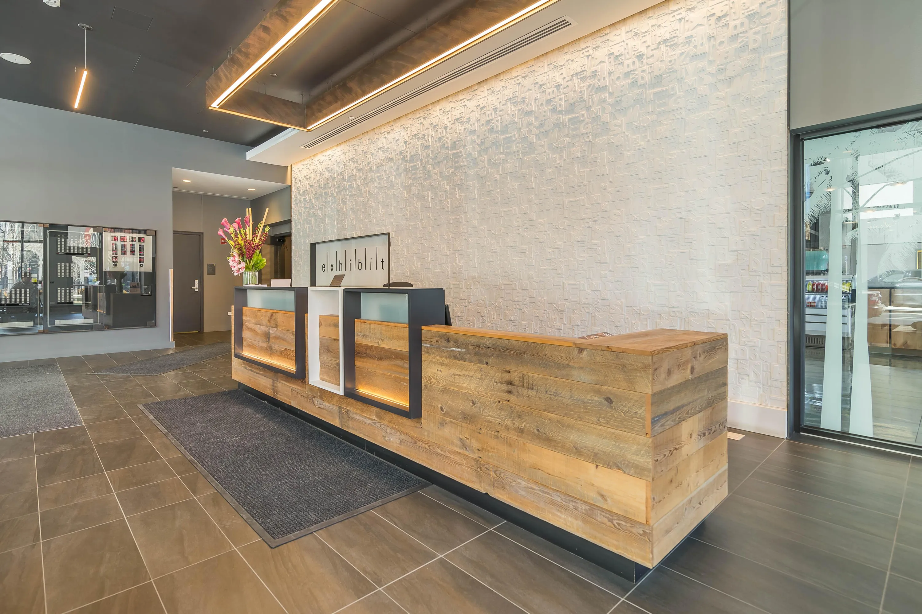 Custom urban old growth reception desk steel glass transaction by icon modern