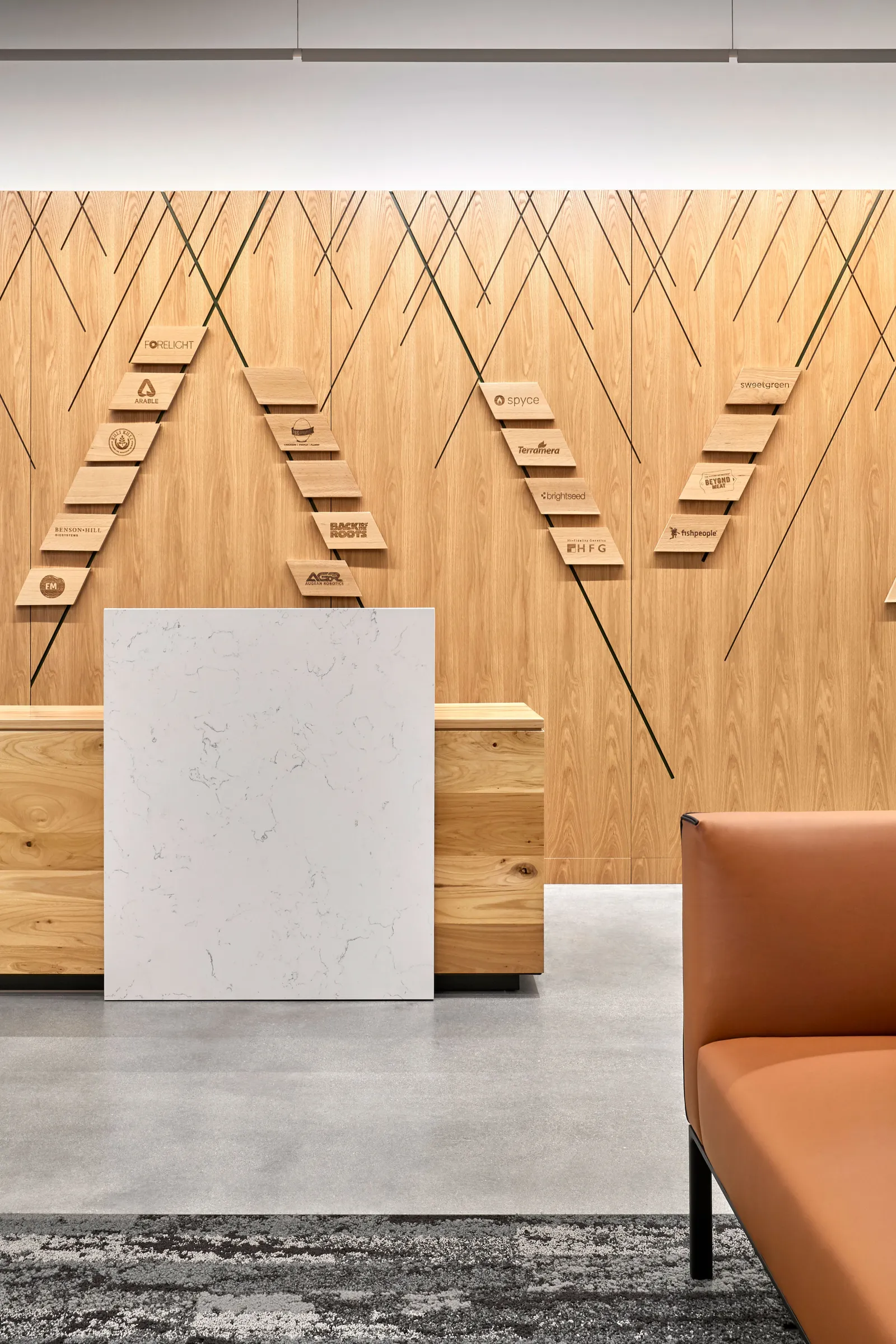 Custom urban wood solid surface transaction reception desk by icon modern