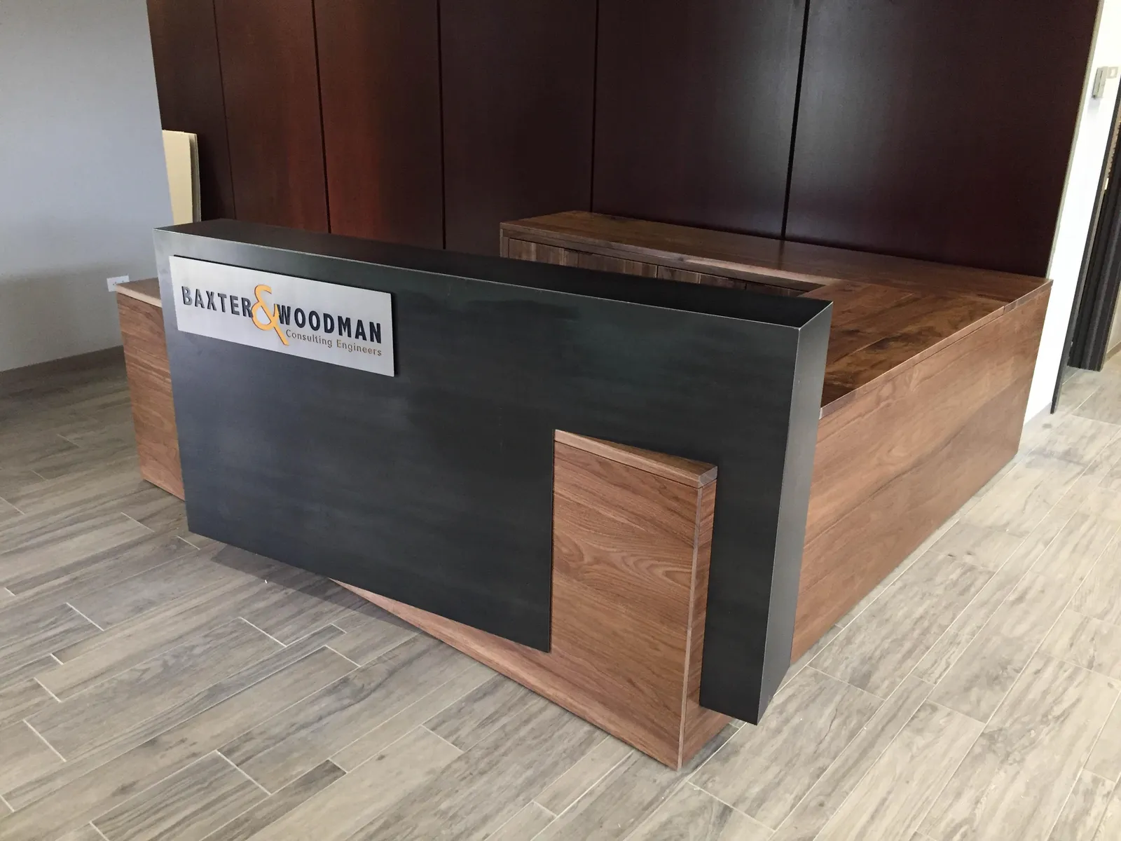 Custom urban walnut steel transaction top reception desk signage branding by icon modern