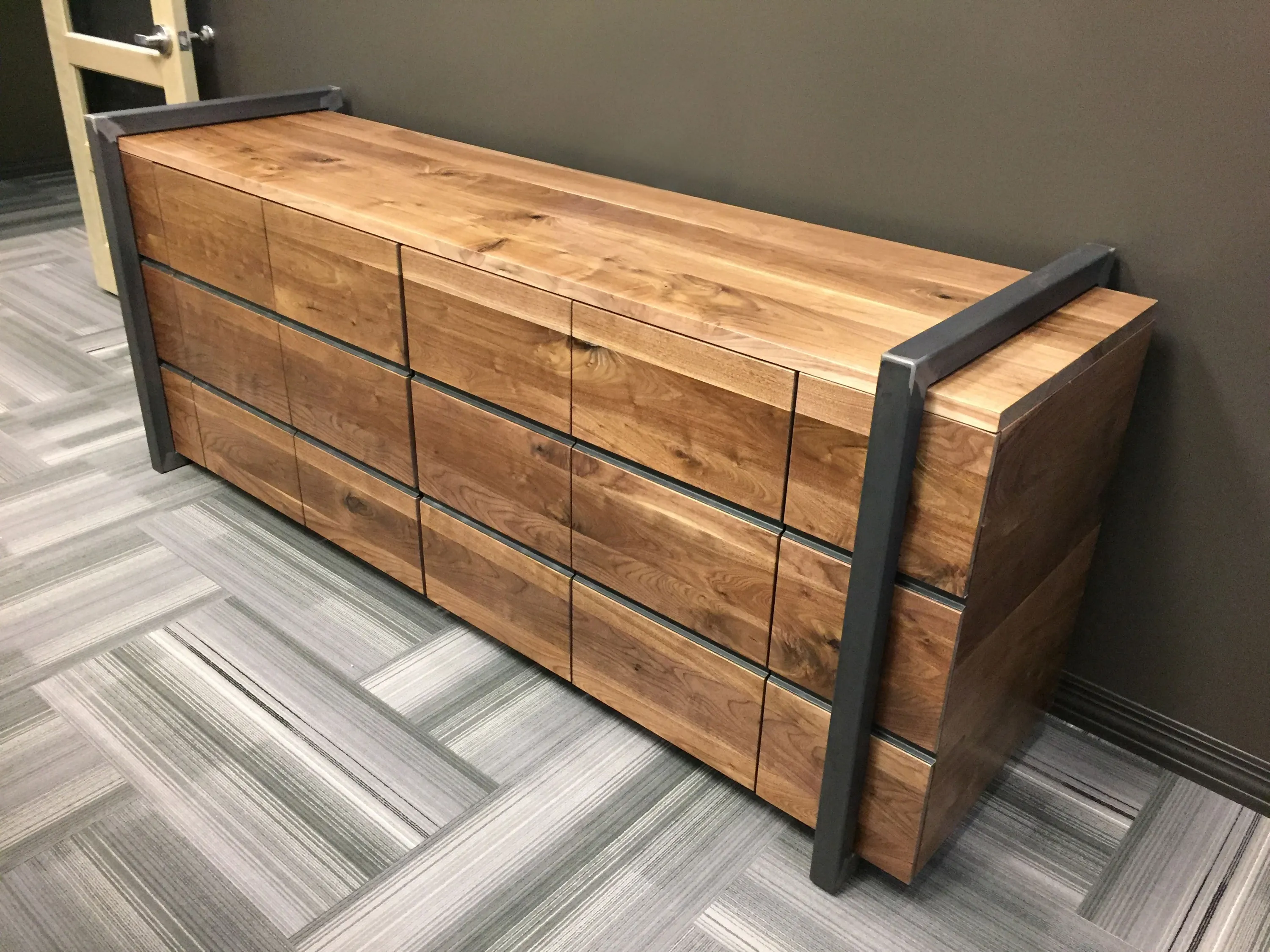 custom credenza in urban walnut with steel accent frames by Icon Modern