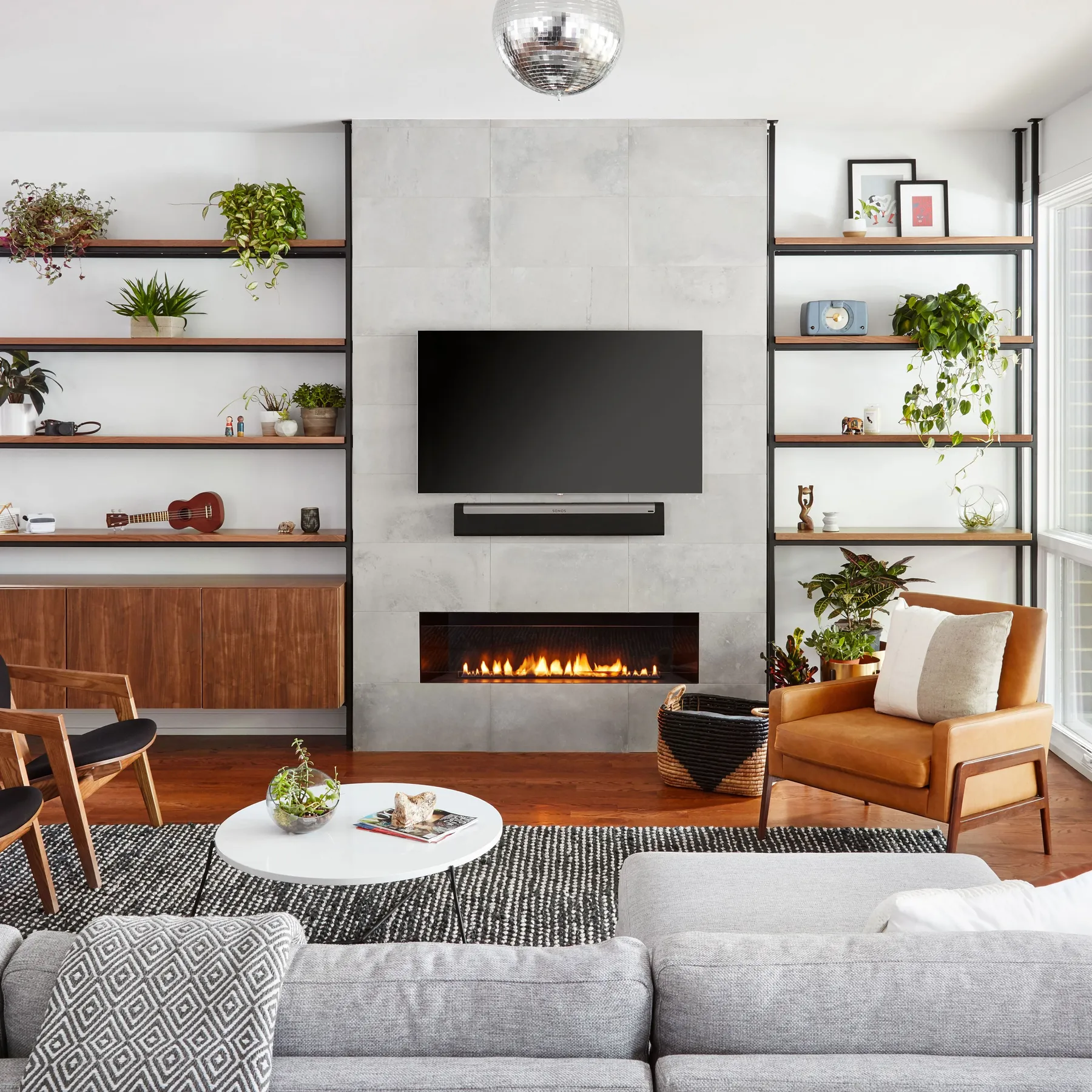 custom shelving in steel and walnut veneer by Icon Modern