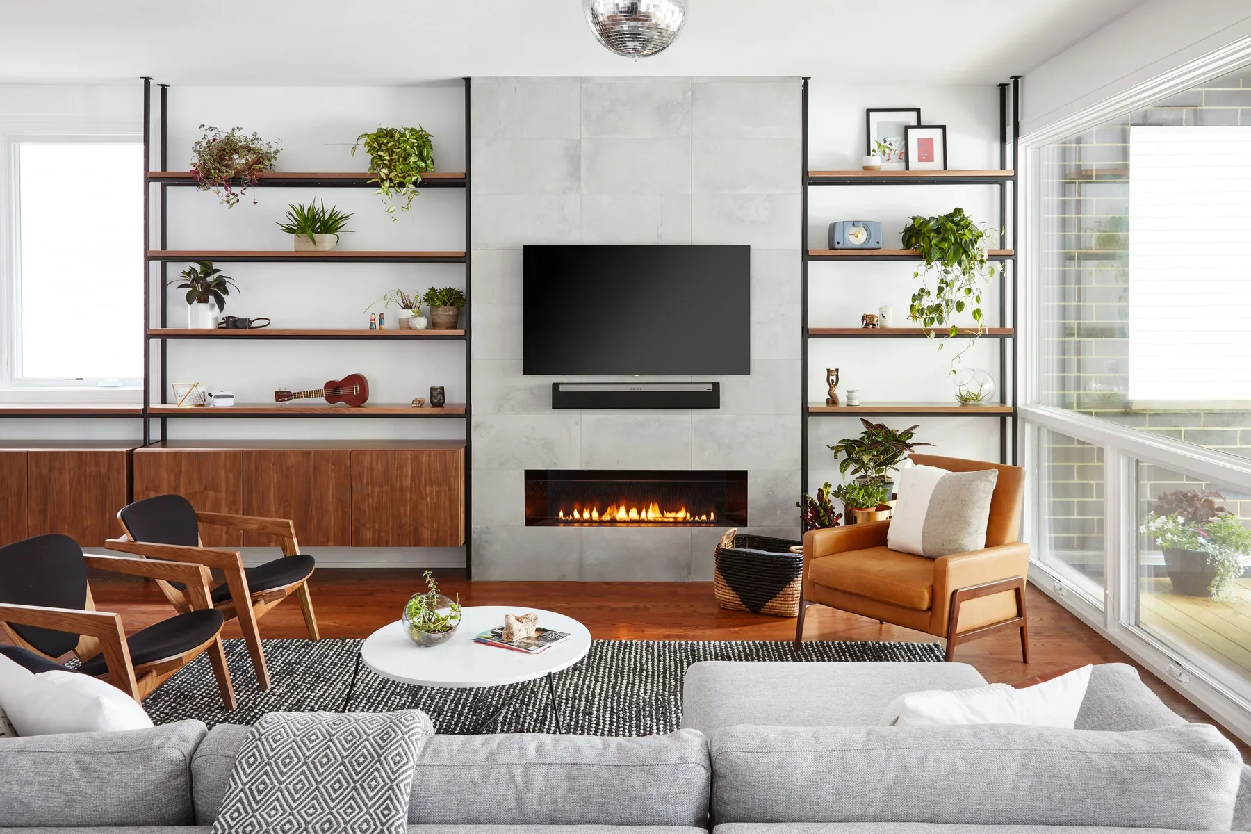 custom shelving in steel and walnut veneer by Icon Modern
