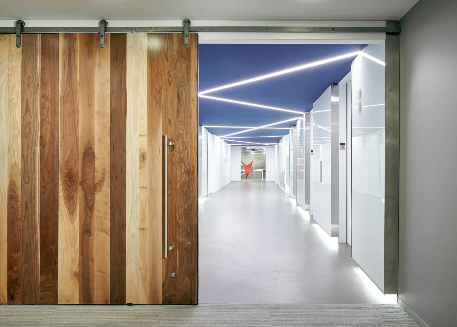 custom sliding door in urban walnut by Icon Modern