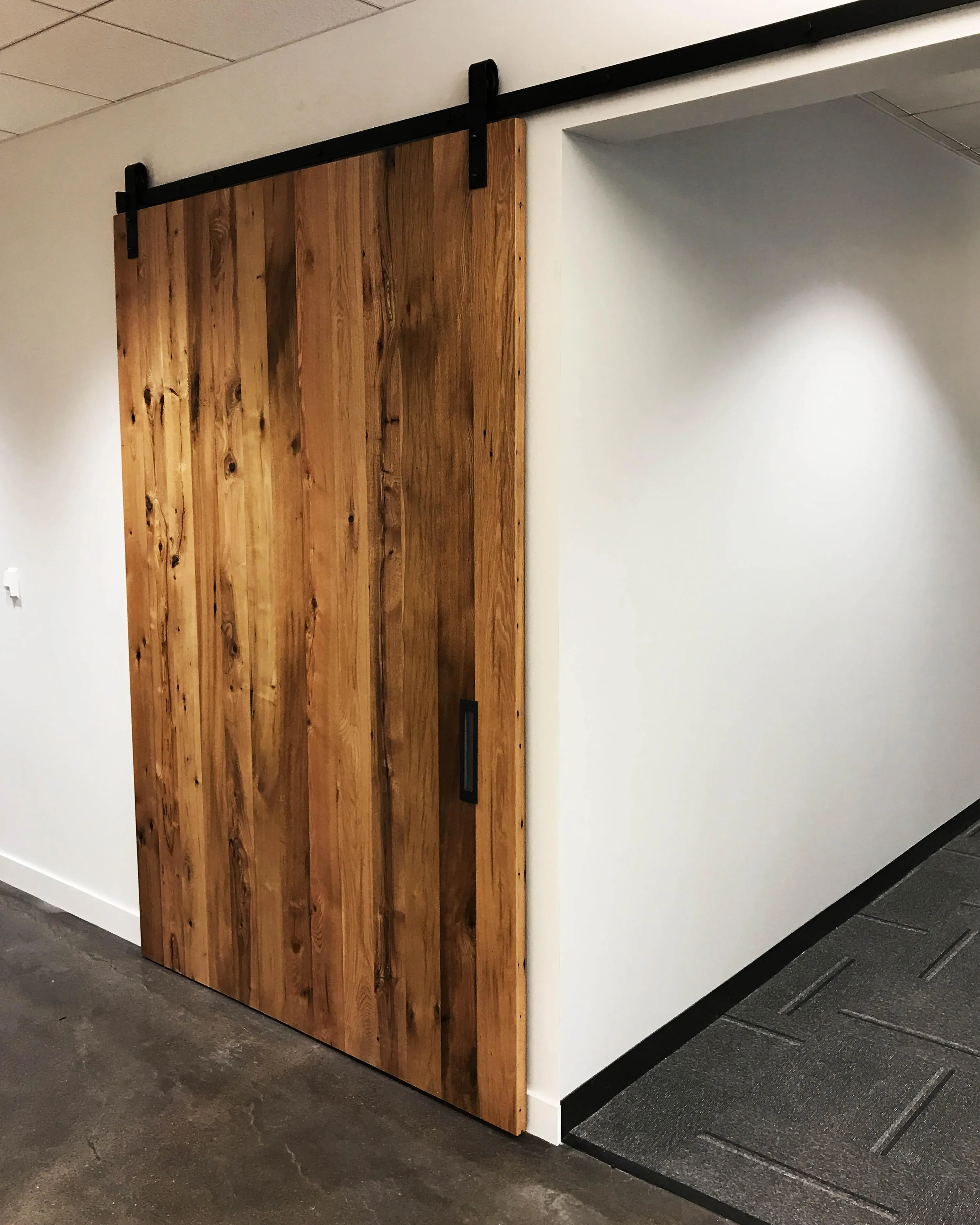 custom sliding door in old growth fir by Icon modern