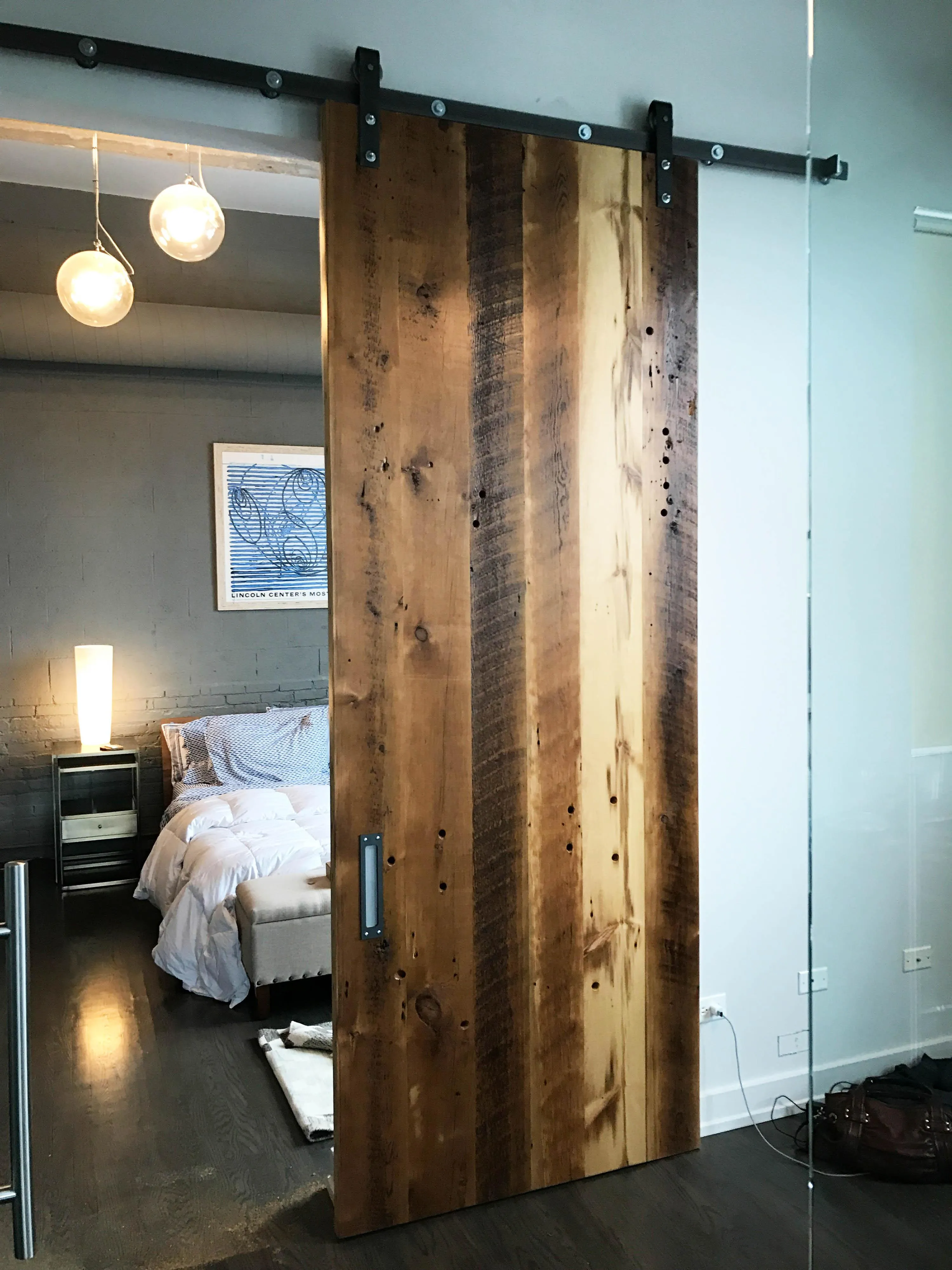 custom sliding door in old growth fir by Icon Modern