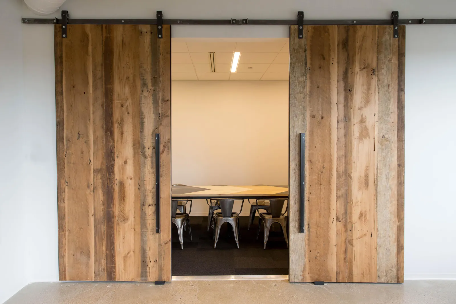 custom sliding door in old growth fir by Icon Modern