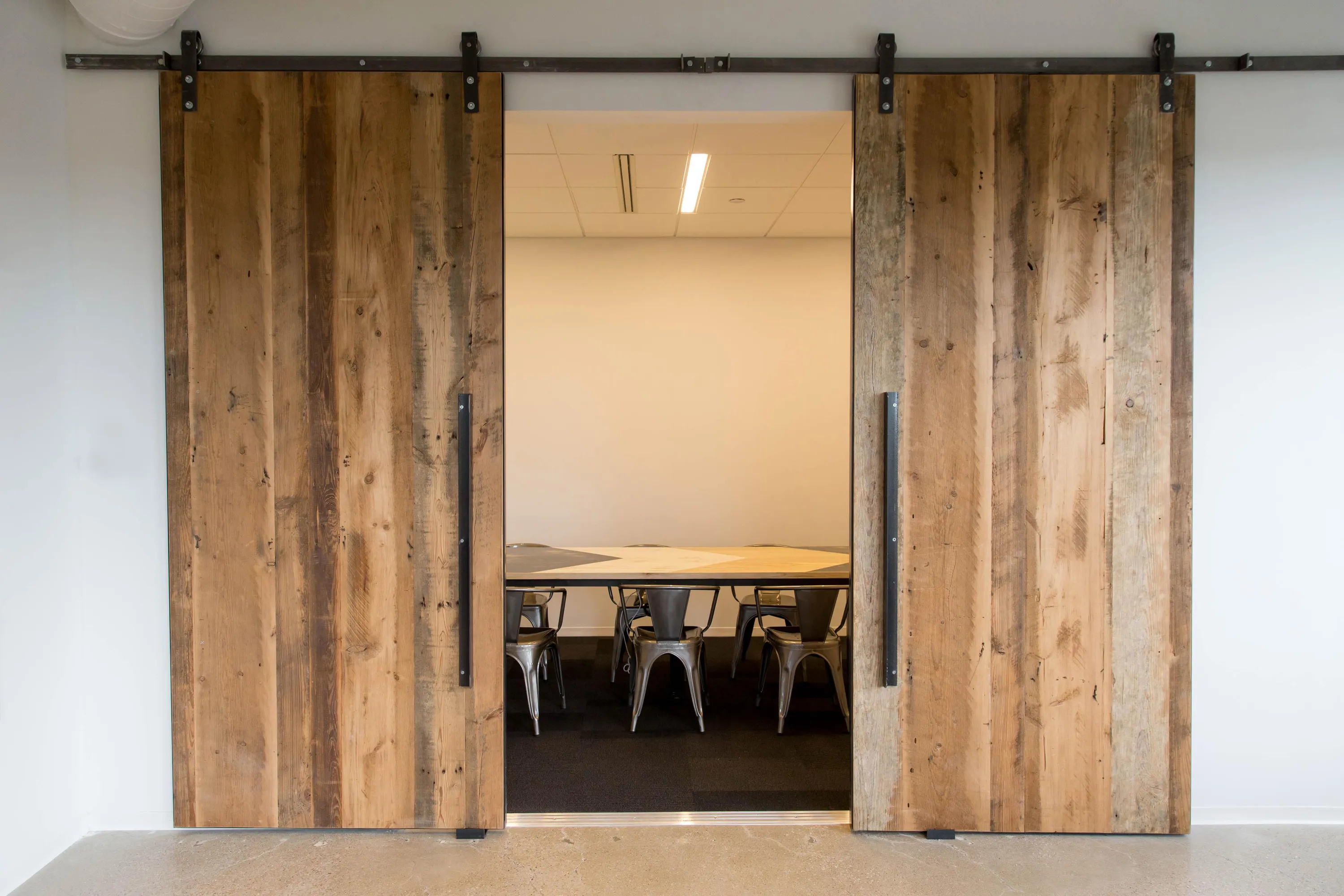 custom sliding door in old growth fir by Icon Modern