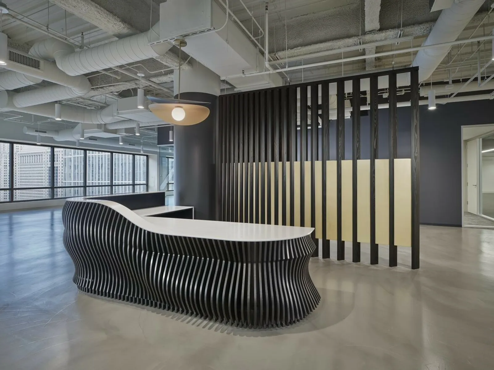 custom space divider featuring wood slats and metal infill panels by Icon Modern