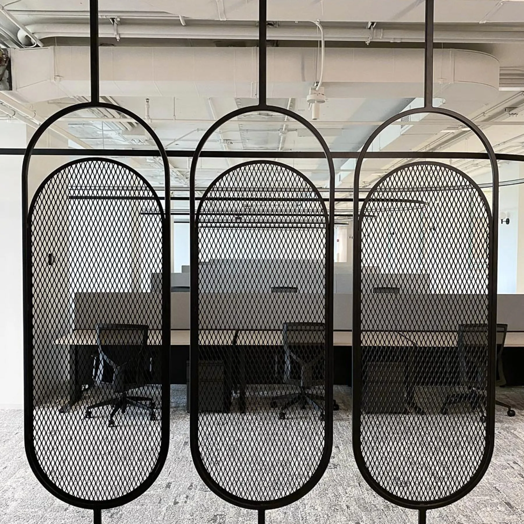 Pill-shaped steel space dividers