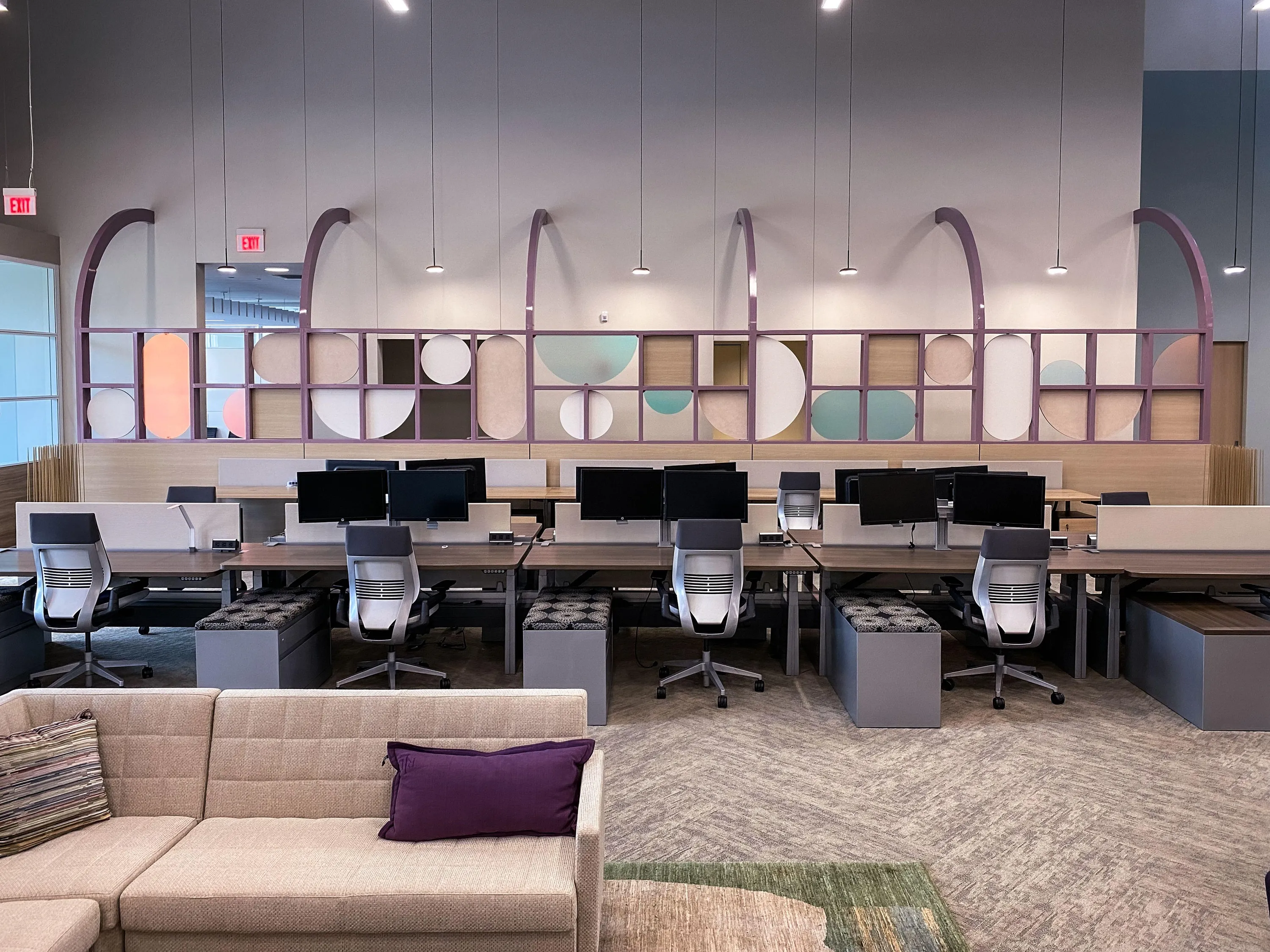 custom space divider with dichroic panels and steel arches by Icon Modern