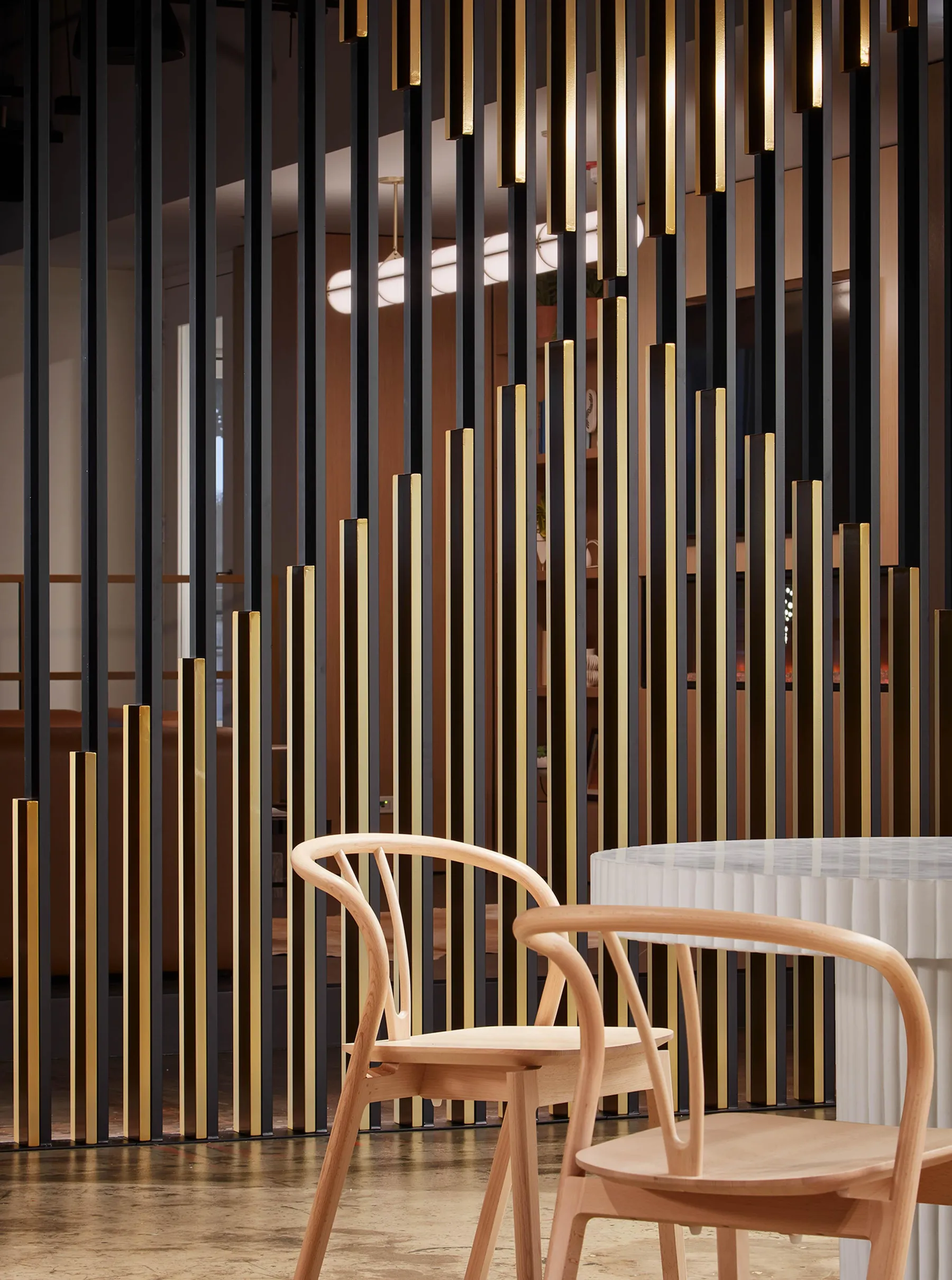 custom space divider with aluminum slats by Icon Modern