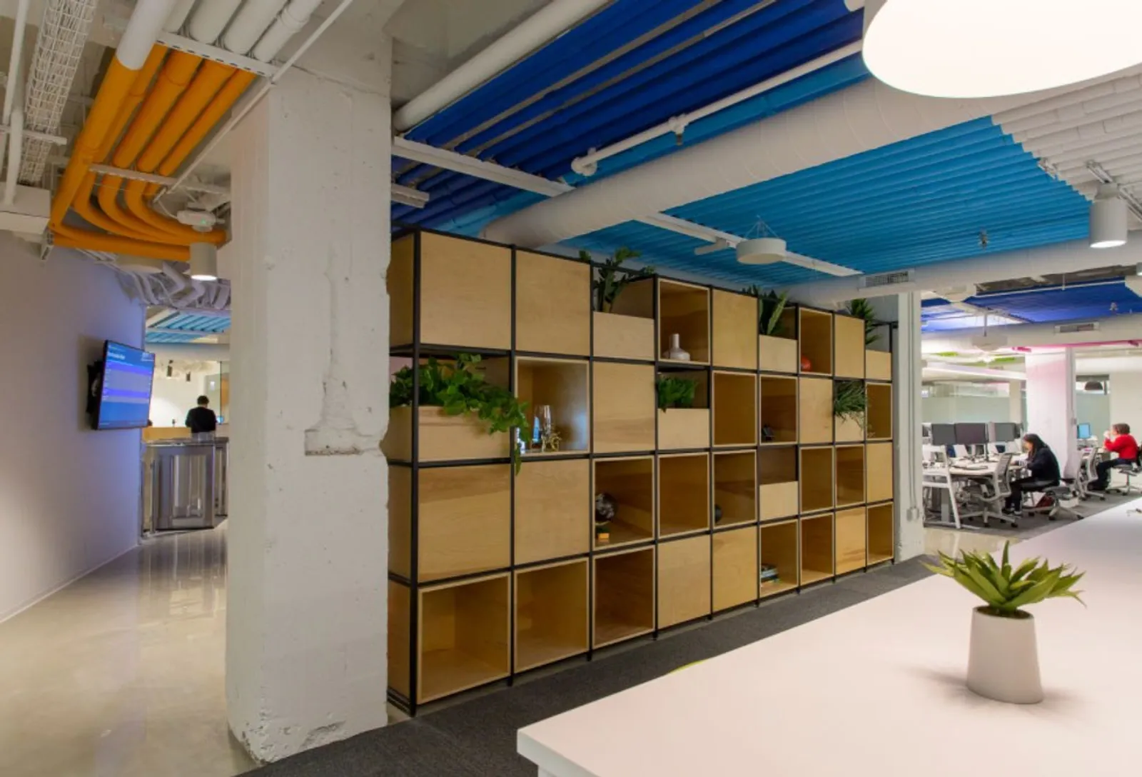 custom space divider with steel grid & urban wood boxes by Icon Modern